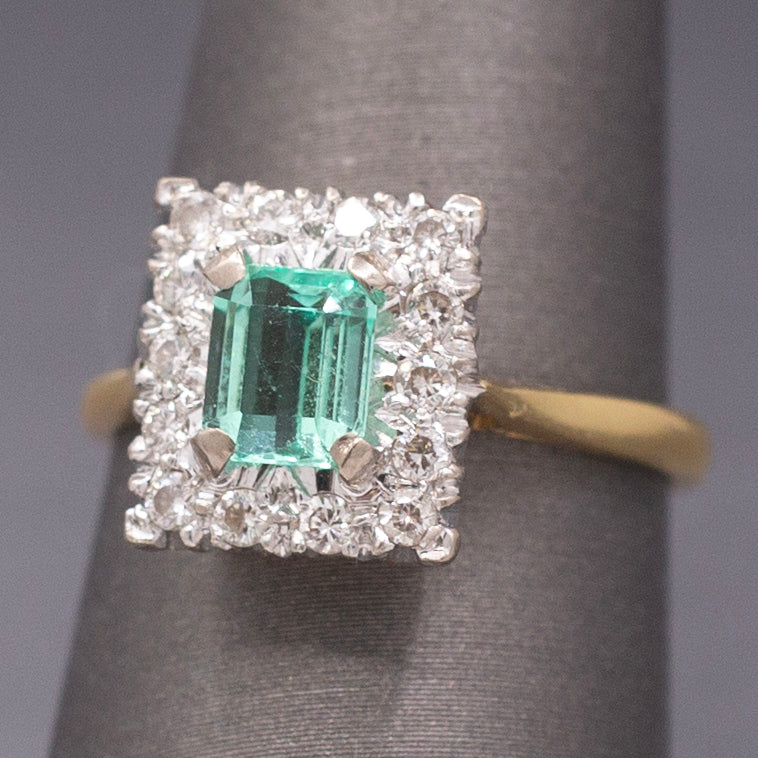 Vintage Emerald Cut Emerald and Diamond Halo Engagement Ring in 18k Yellow Gold