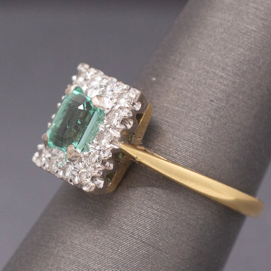 Vintage Emerald Cut Emerald and Diamond Halo Engagement Ring in 18k Yellow Gold