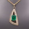 Modernist Natural Emerald and Channel Set Diamond Pendant in 14k Yellow Gold