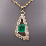 Modernist Natural Emerald and Channel Set Diamond Pendant in 14k Yellow Gold