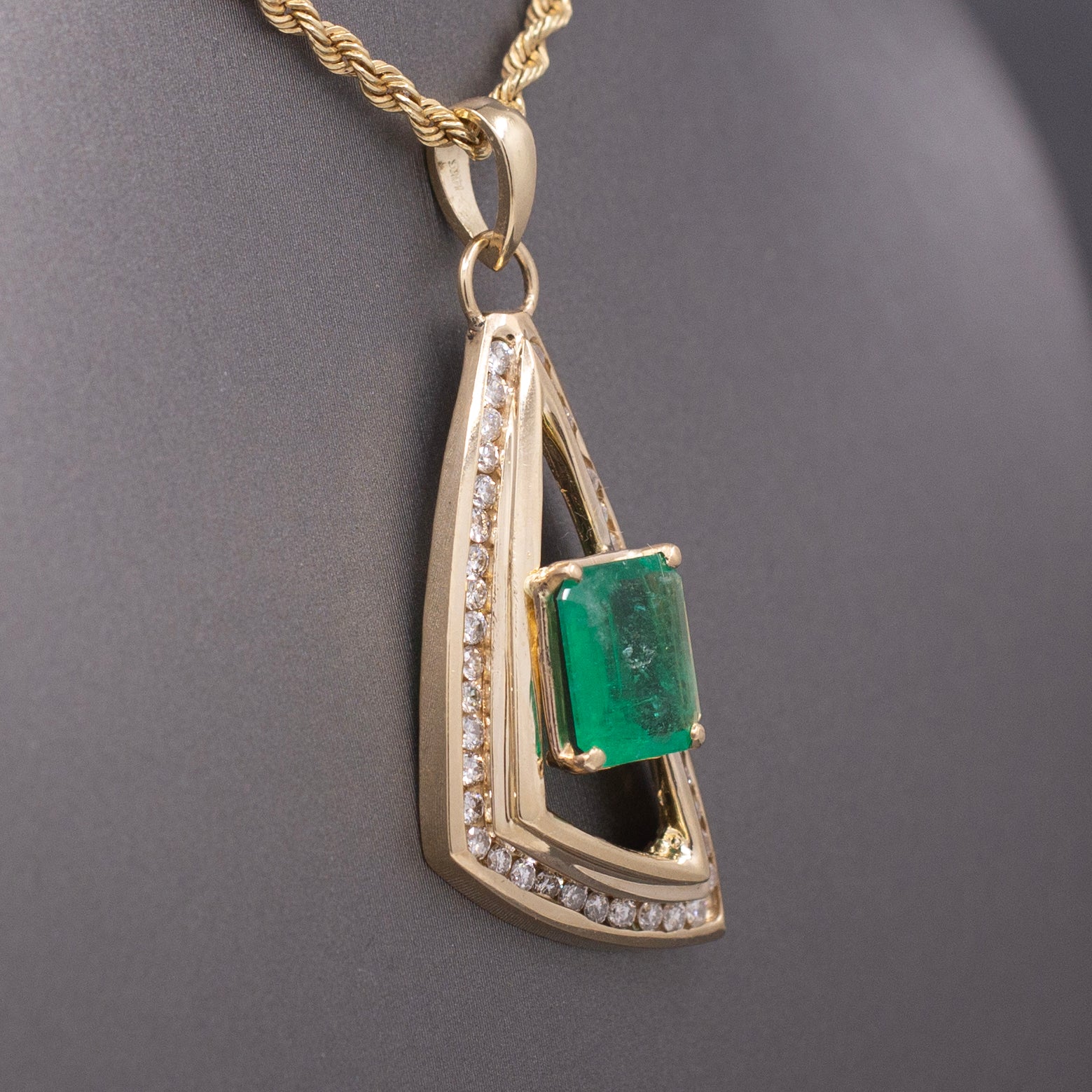 Modernist Natural Emerald and Channel Set Diamond Pendant in 14k Yellow Gold