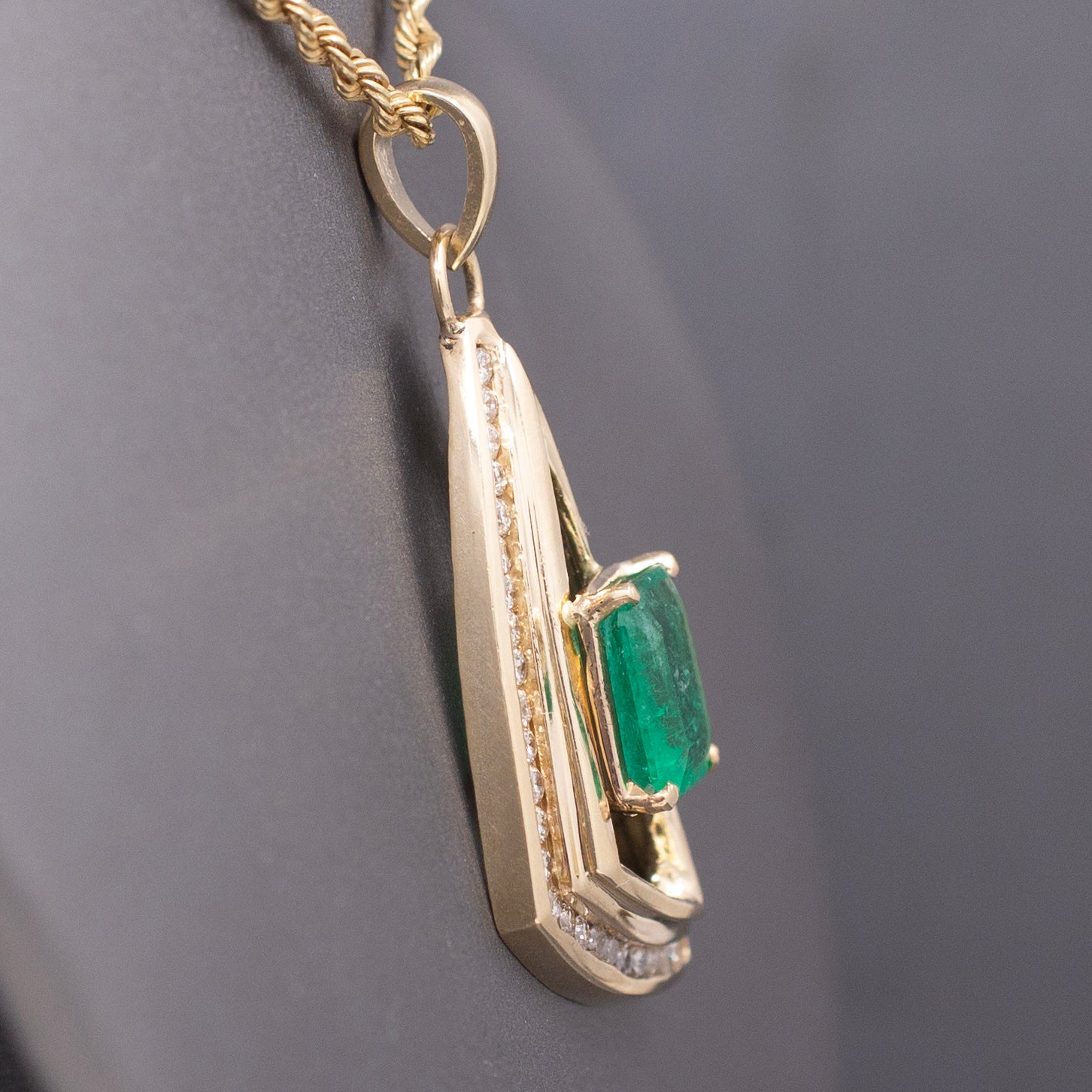Modernist Natural Emerald and Channel Set Diamond Pendant in 14k Yellow Gold