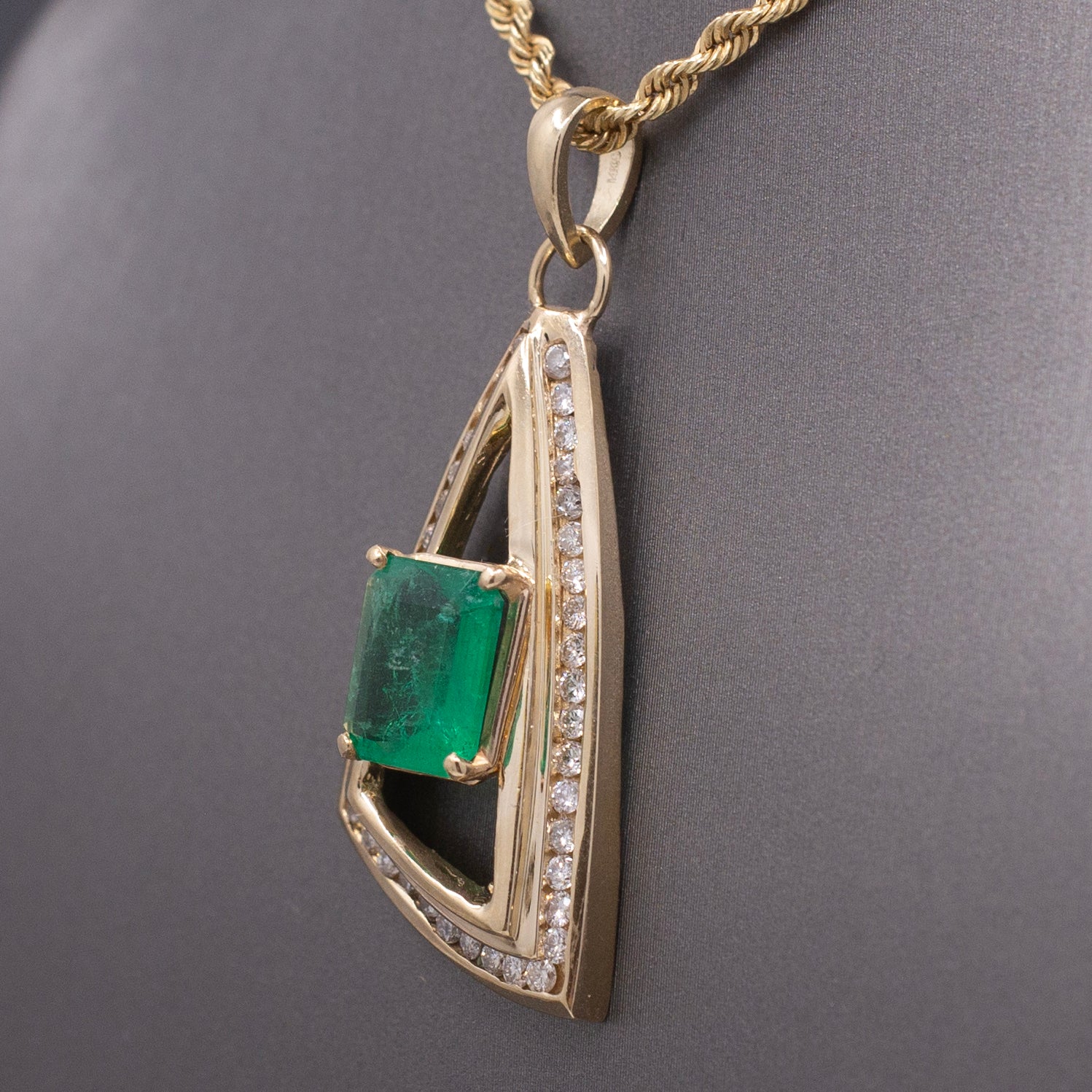 Modernist Natural Emerald and Channel Set Diamond Pendant in 14k Yellow Gold