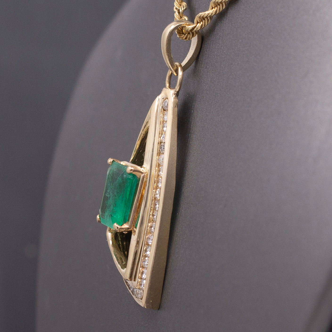 Modernist Natural Emerald and Channel Set Diamond Pendant in 14k Yellow Gold