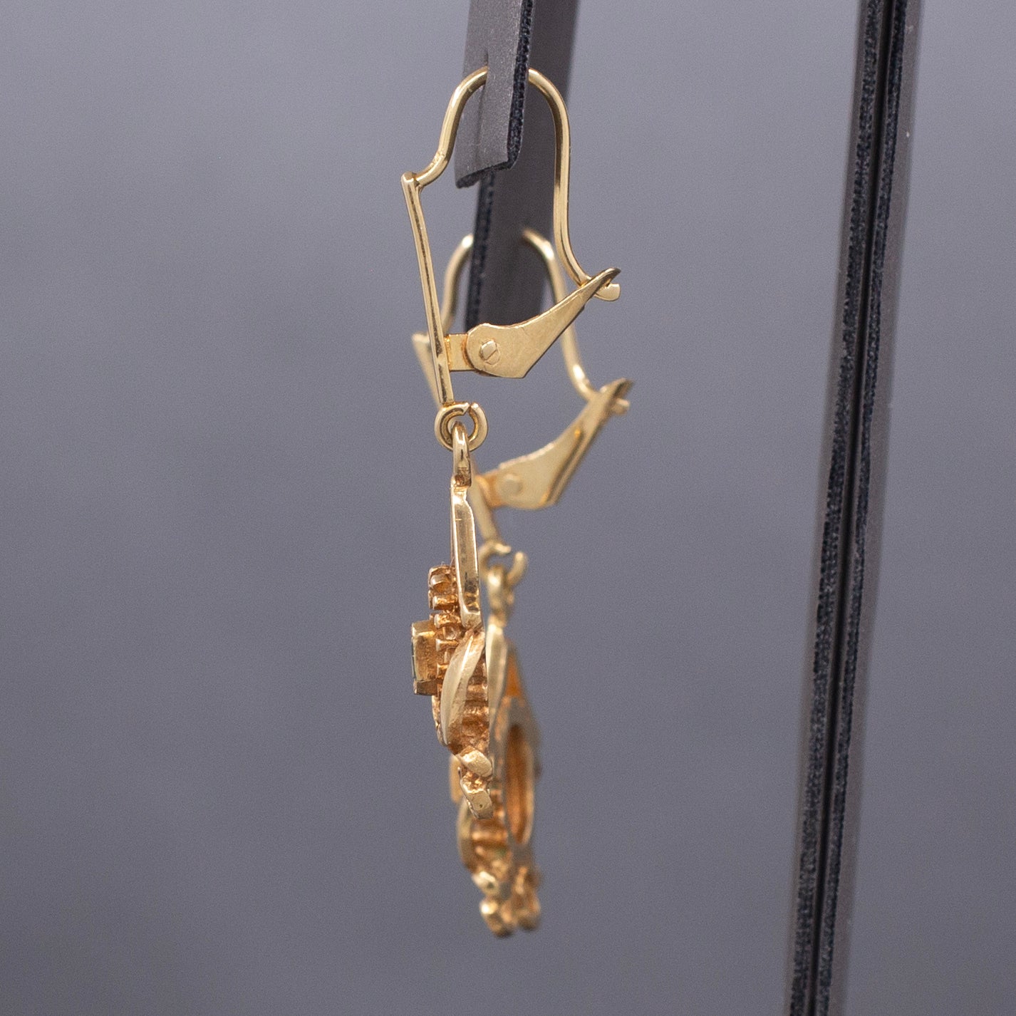 Feminine Bezel Set Emerald Dangle Drop Earrings in 18k Yellow Gold