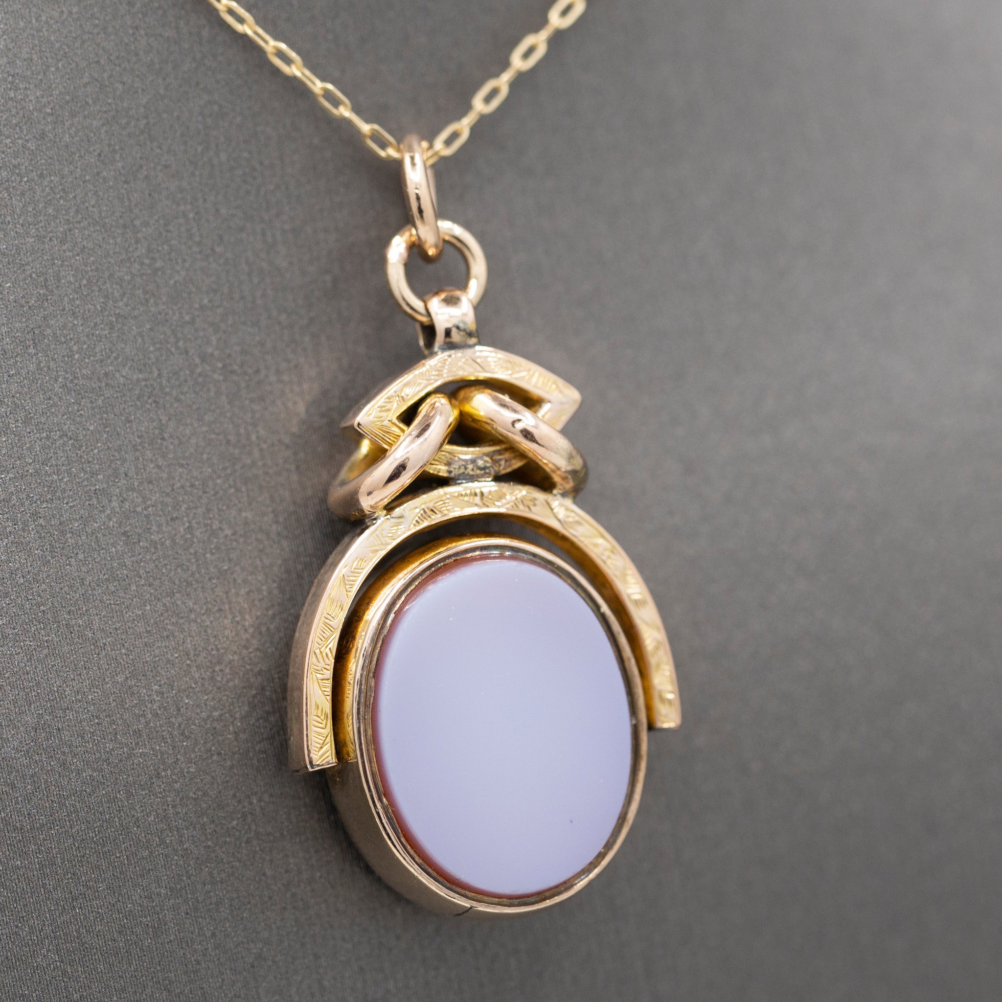Antique Victorian Spinning Oval Bloodstone and Onyx Fob Pendant in 10k Yellow Gold