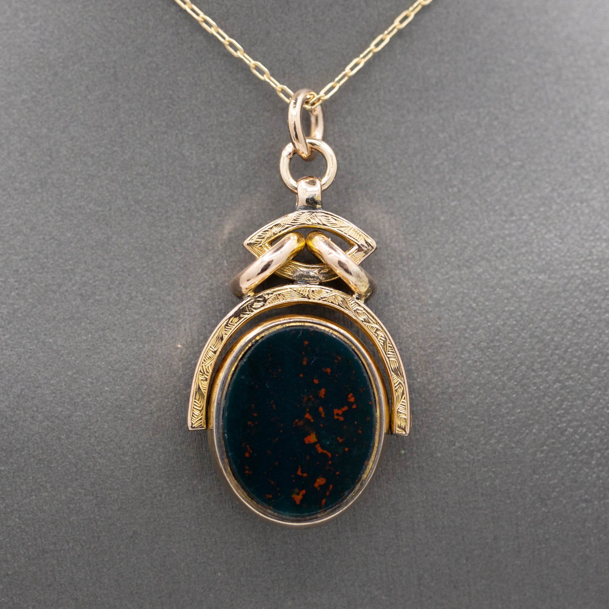 Antique Victorian Spinning Oval Bloodstone and Onyx Fob Pendant in 10k Yellow Gold