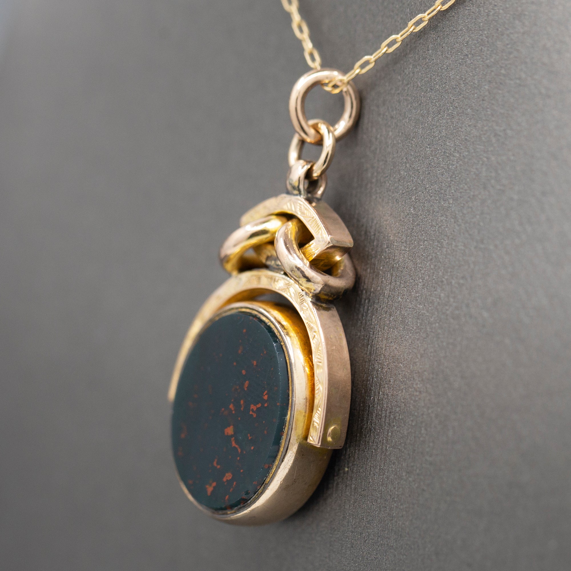 Antique Victorian Spinning Oval Bloodstone and Onyx Fob Pendant in 10k Yellow Gold