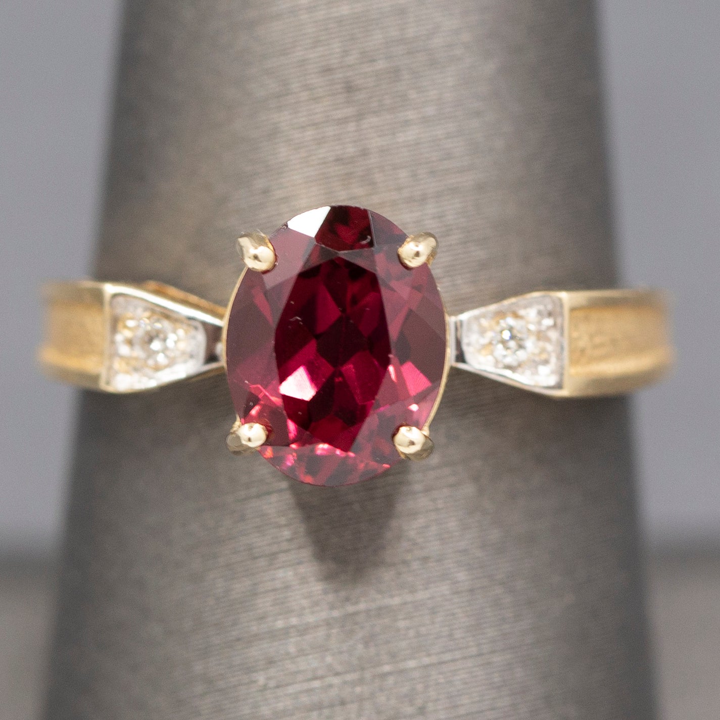 Ravishing Rhodolite Garnet and Diamond Accent Bow Ring in 14k Yellow Gold