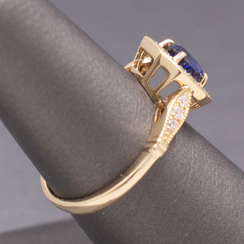 Vintage Sparkling Blue Sapphire and Diamond Octagonal Halo in 14k Yellow Gold