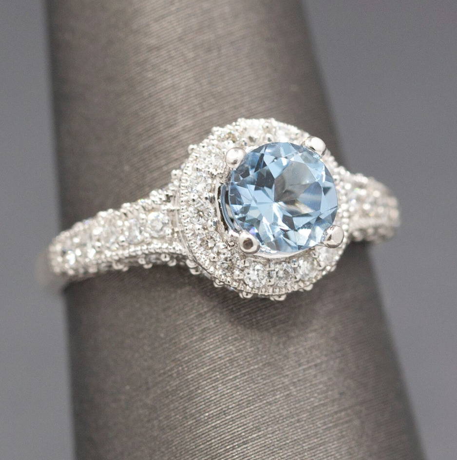 Beautiful Blue Aquamarine and Diamond Halo Ring in 14k White Gold