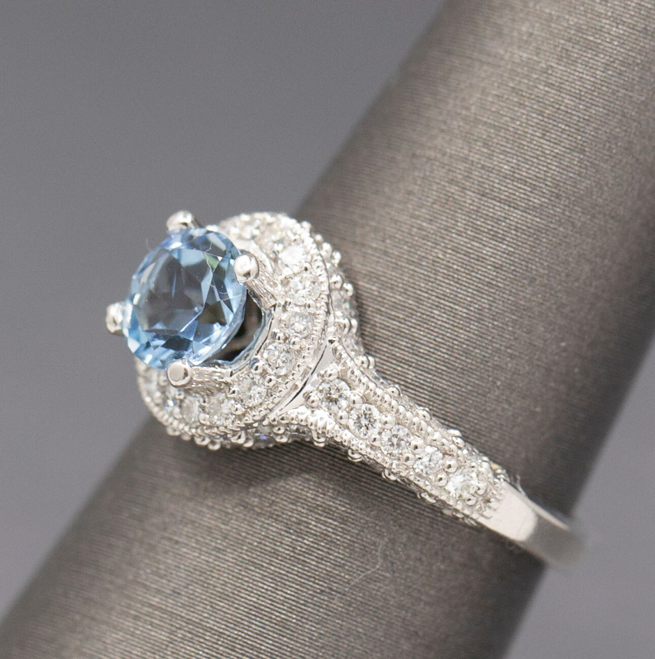 Beautiful Blue Aquamarine and Diamond Halo Ring in 14k White Gold