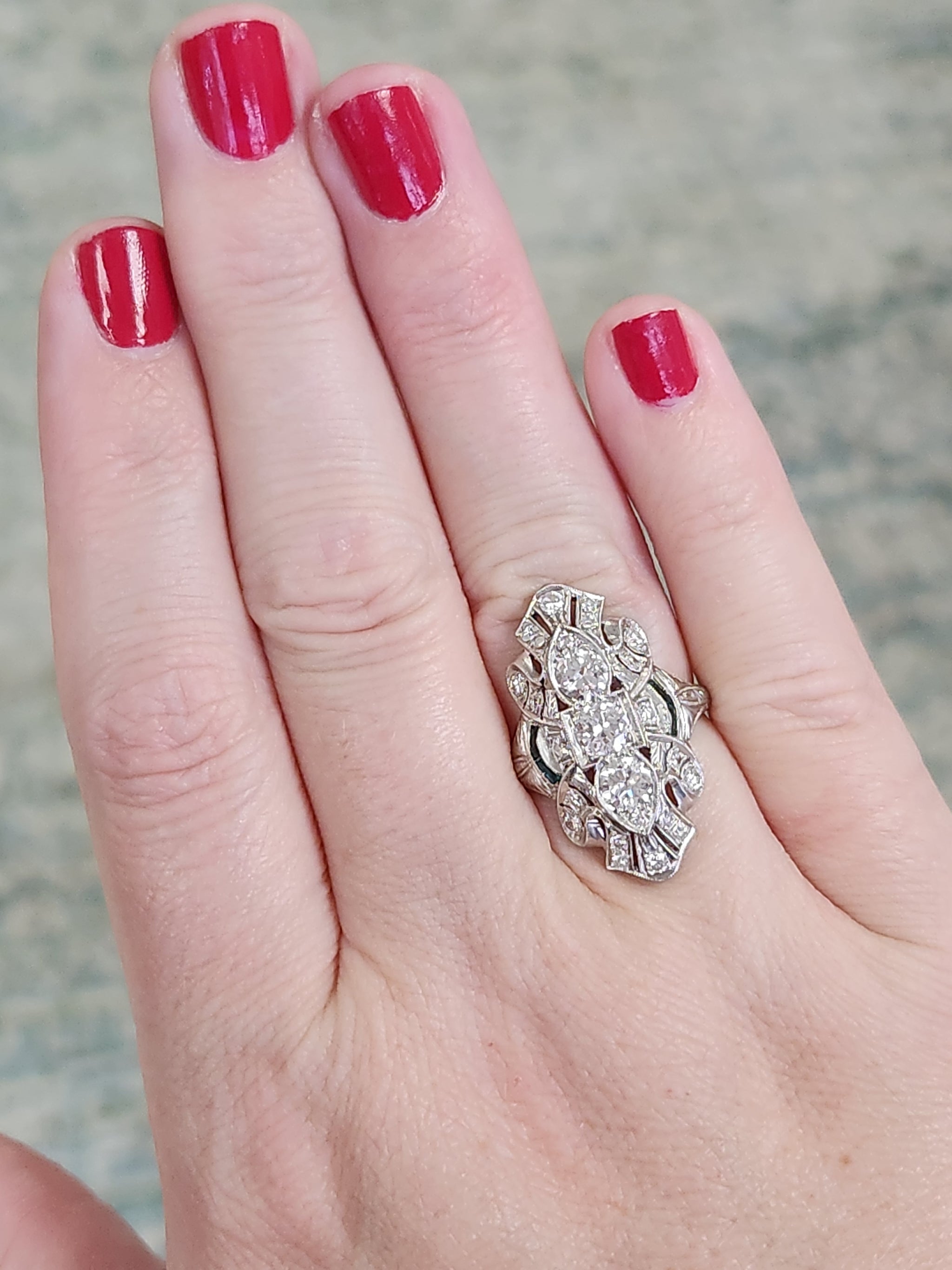 Exquisite Art Deco Elongated Emerald and Old European Cut Diamond Ring in Platinum