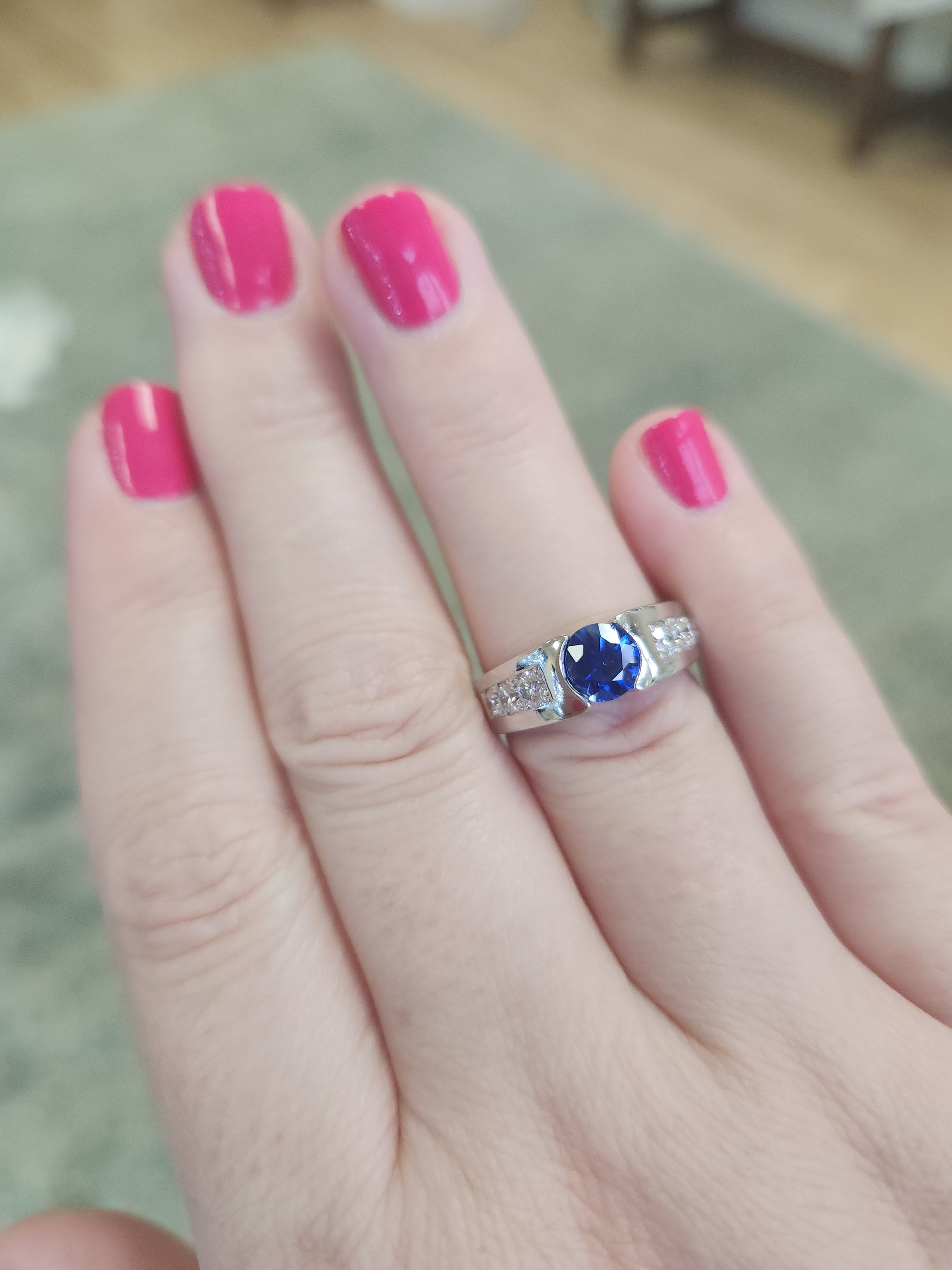 Stunning Vivid Blue Sapphire and Channel Set Diamond Ring in Platinum