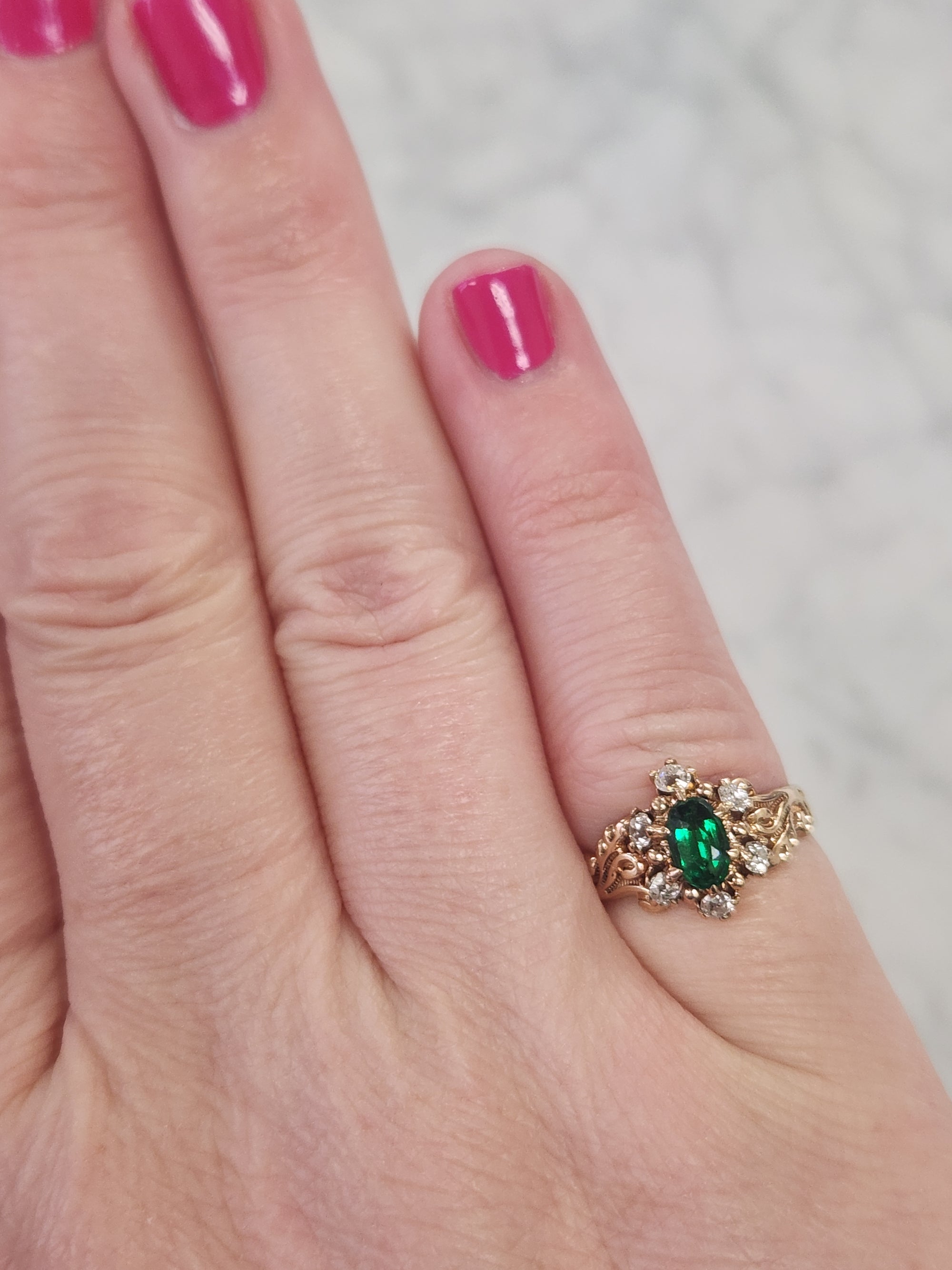 Victorian Oval Cut Emerald and Old Mine Cut Diamond Ring in Rosy Gold