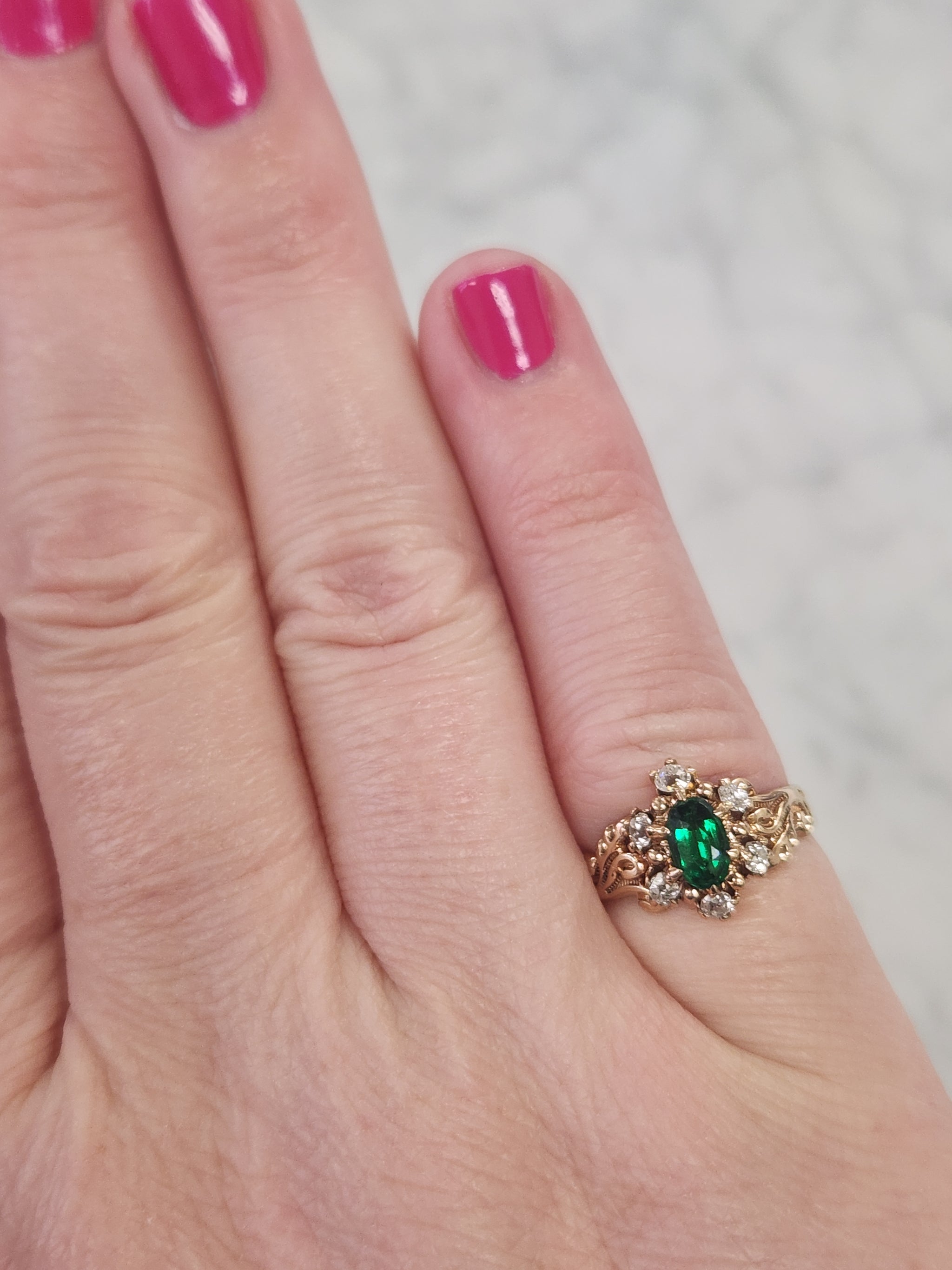 Victorian Oval Cut Emerald and Old Mine Cut Diamond Ring in Rosy Gold