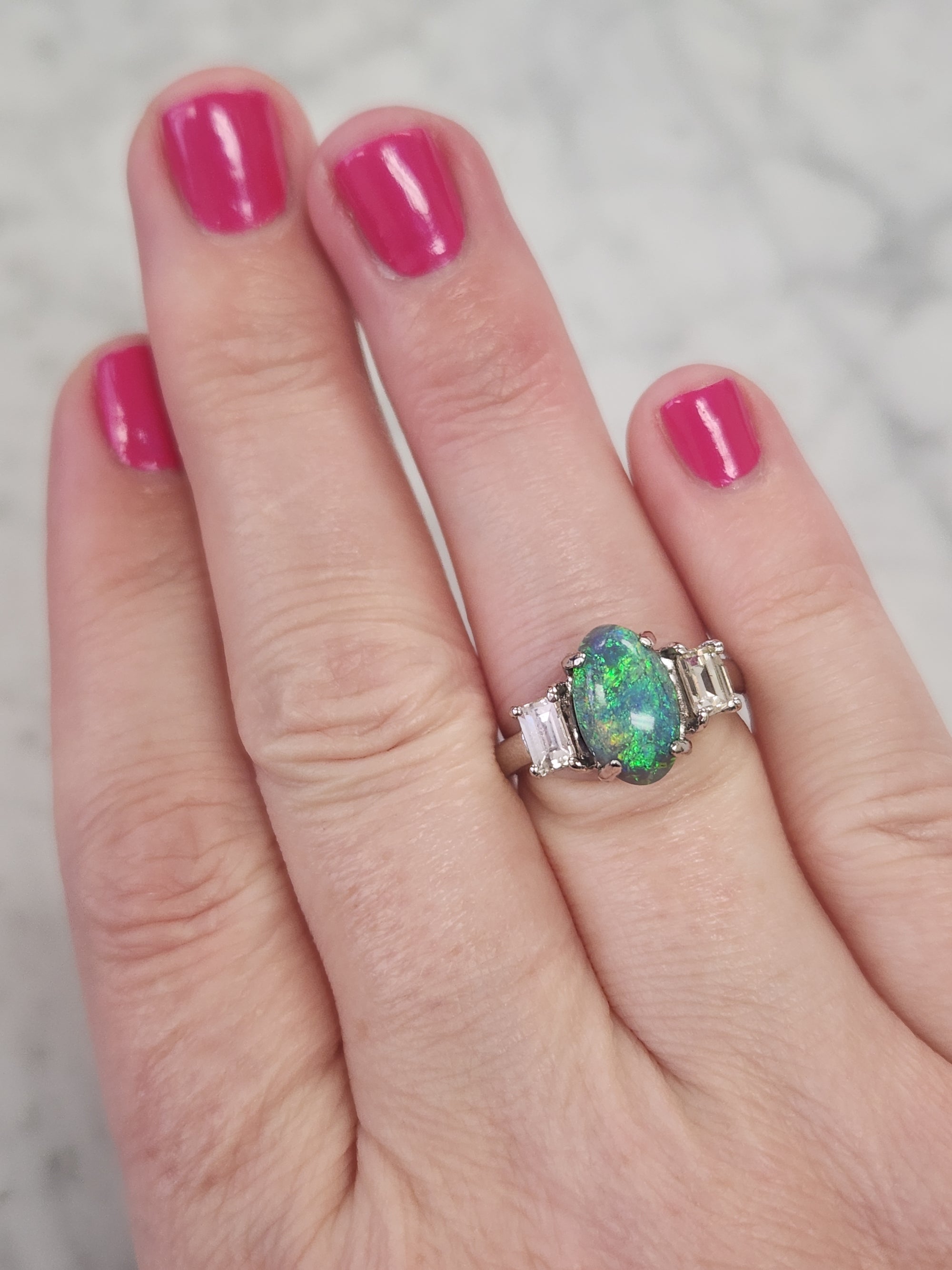 Exquisite Black Opal and Trapezoid Cut Diamond Three Stone Ring in Platinum