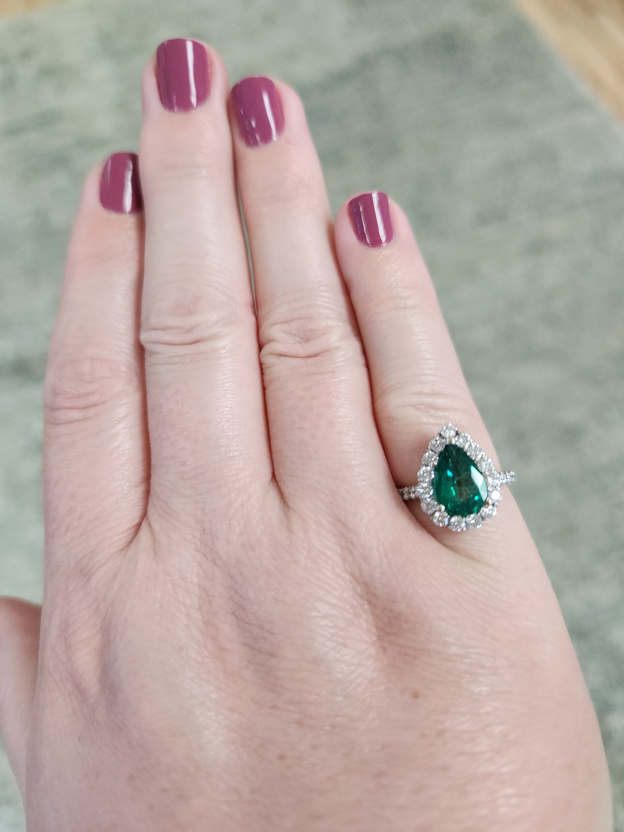 Exquisite GIA Certified Pear Cut Emerald and Diamond Halo Ring in 18k White Gold