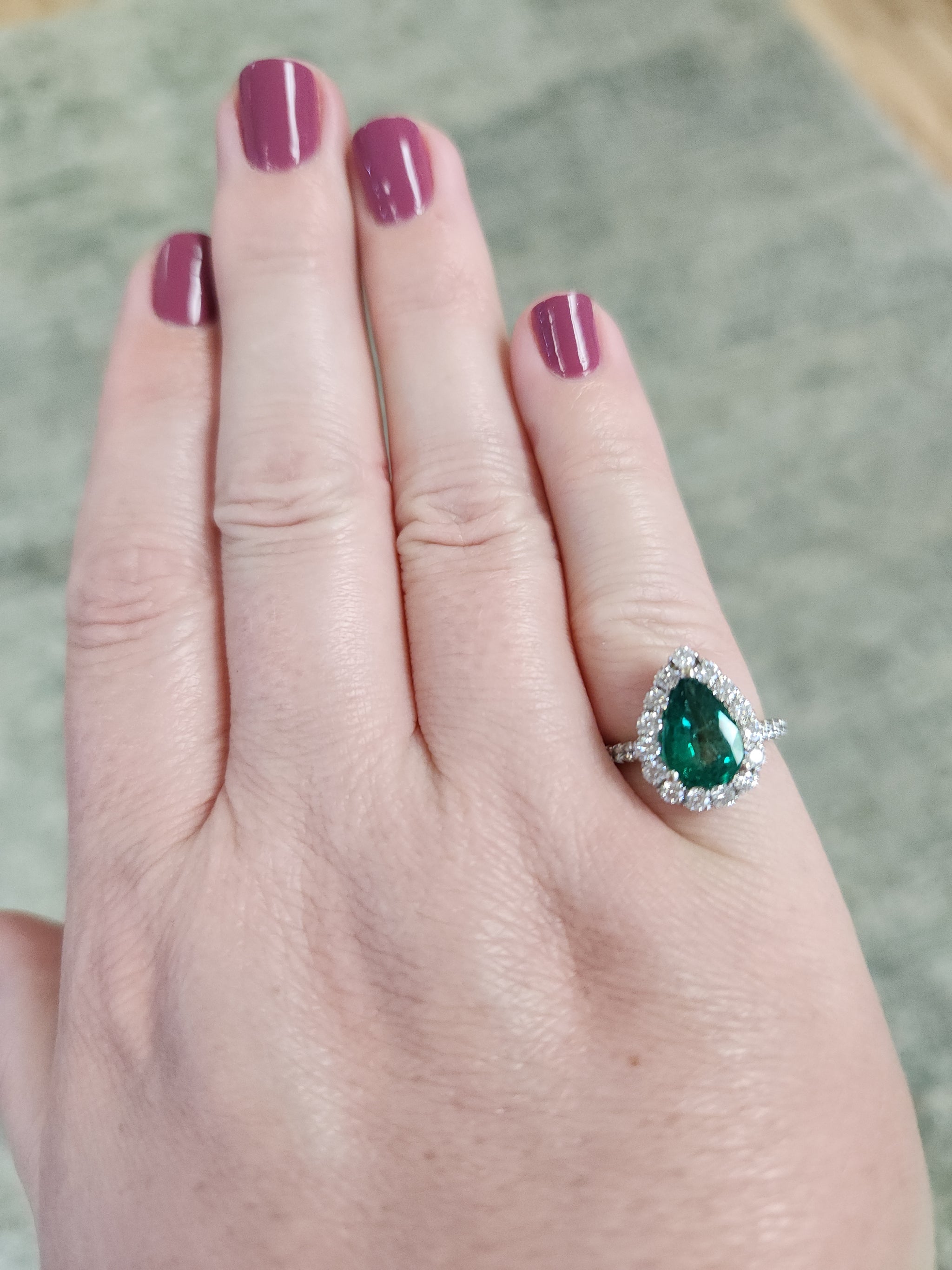 Exquisite GIA Certified Pear Cut Emerald and Diamond Halo Ring in 18k White Gold