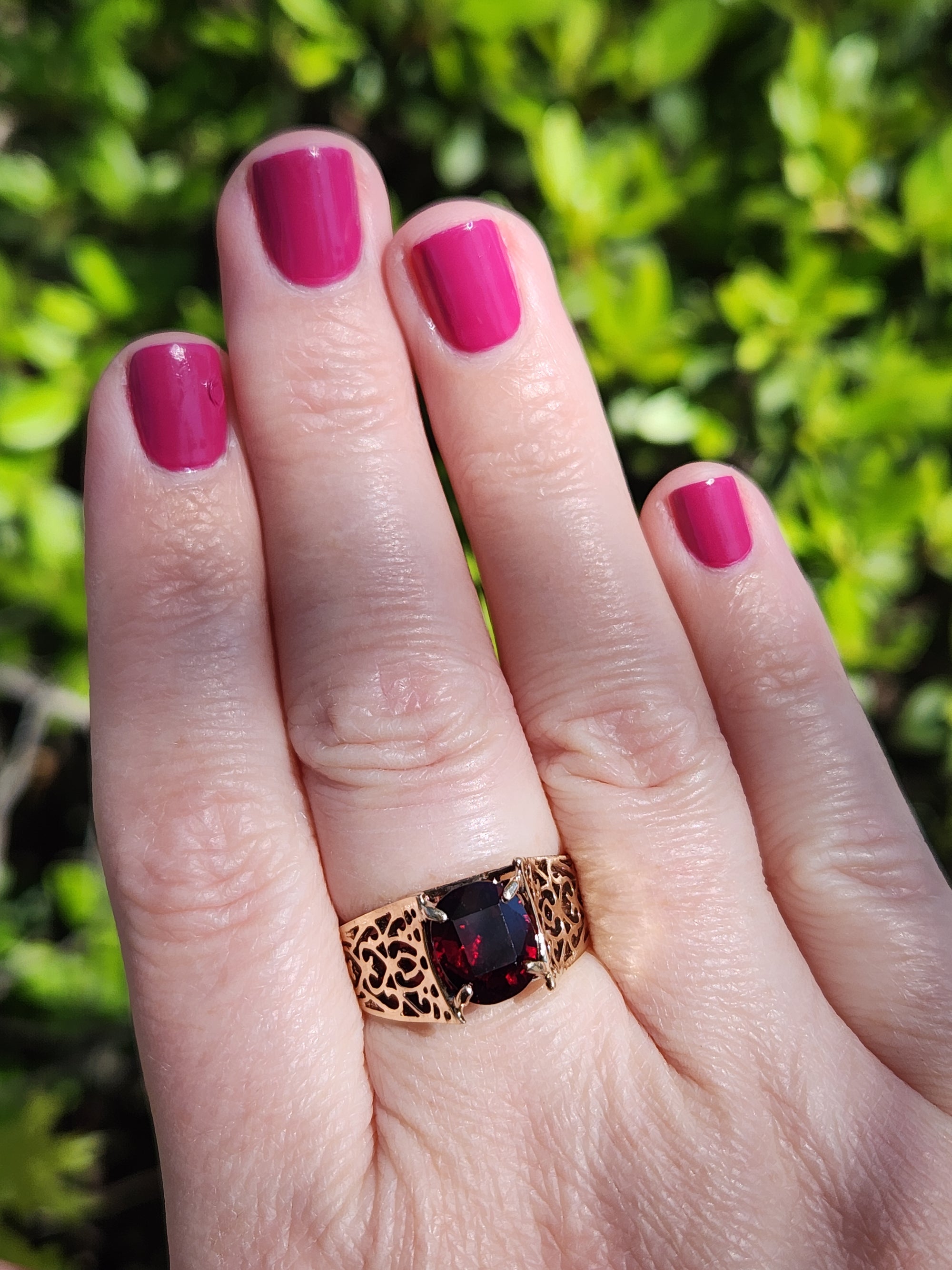 Vintage Garnet Pierced Band Solitaire Ring in 14k Yellow Gold