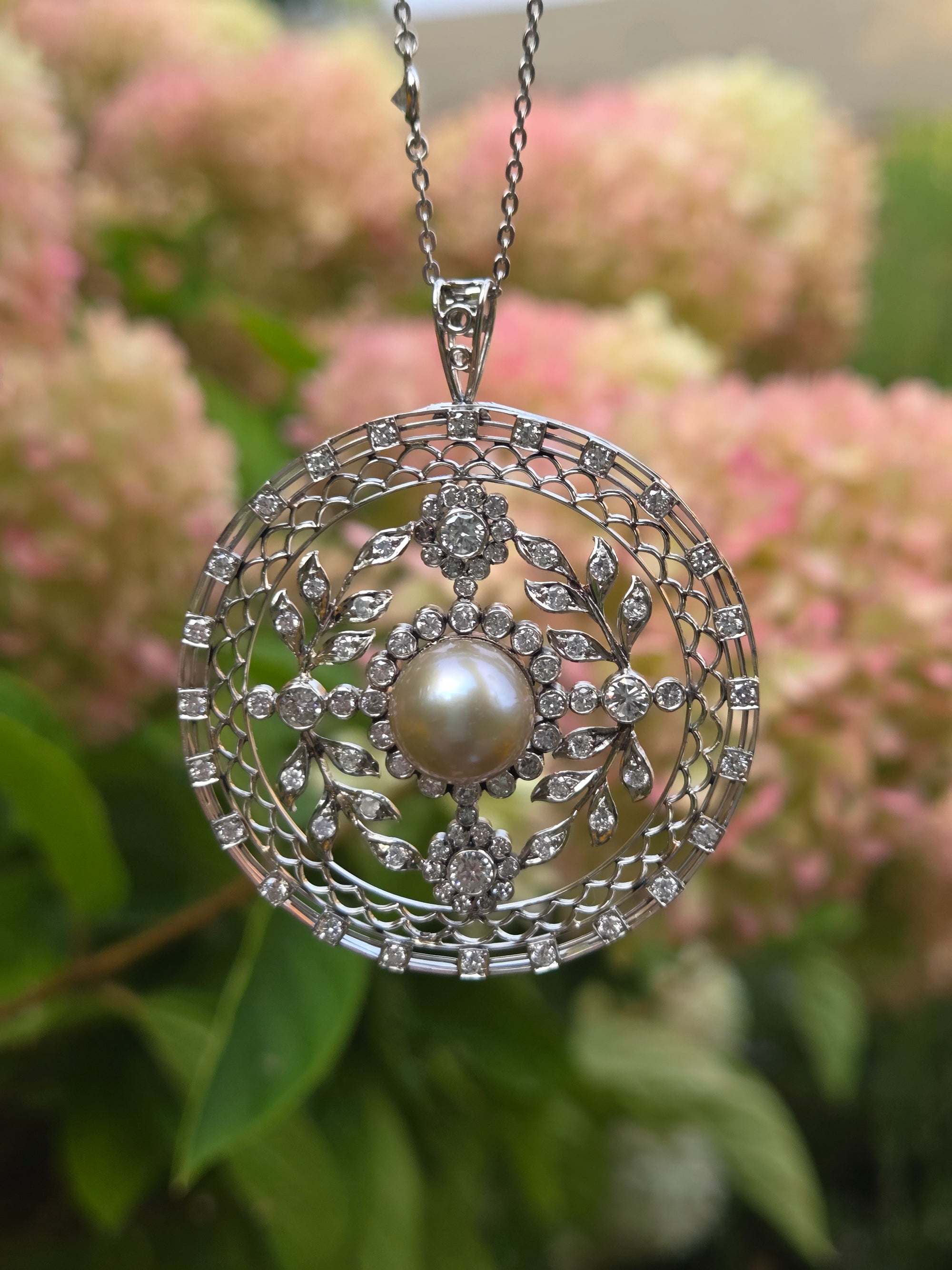 Late Art Deco Pearl and Diamond Medallion Pendant in Platinum