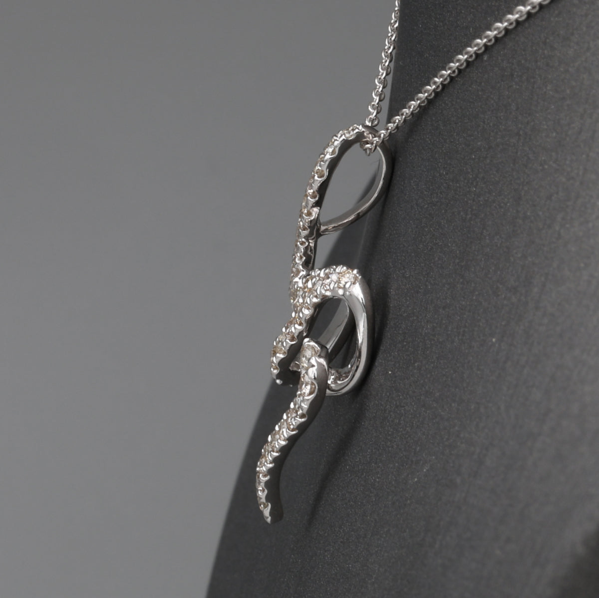 Sparkling Diamond Twist Swirl Pendant Necklace in 14k White Gold