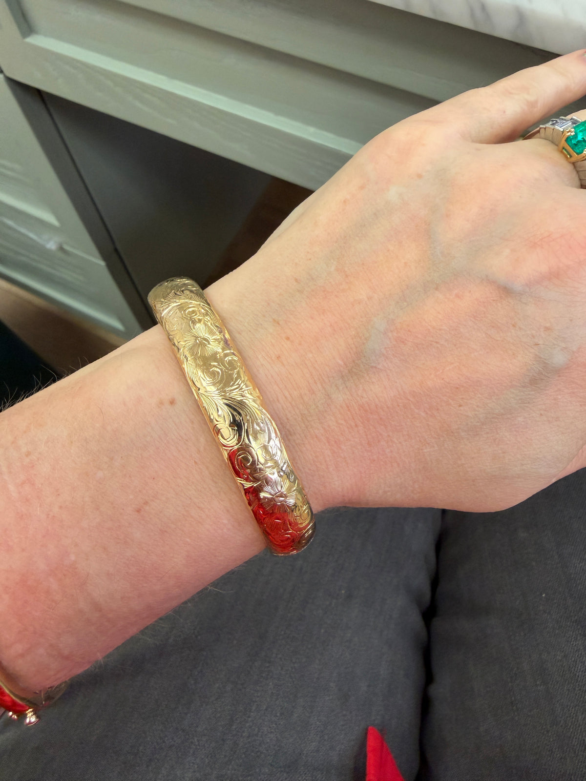 Floral Engraved Domed Oval Hinged Bangle in 14k Yellow Gold