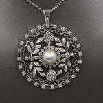 Late Art Deco Pearl and Diamond Medallion Pendant in Platinum
