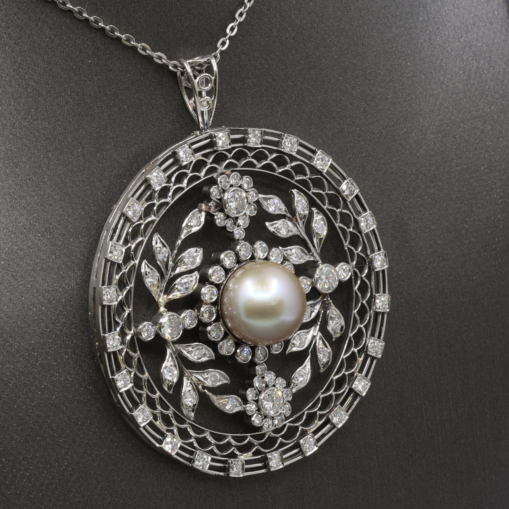 Late Art Deco Pearl and Diamond Medallion Pendant in Platinum