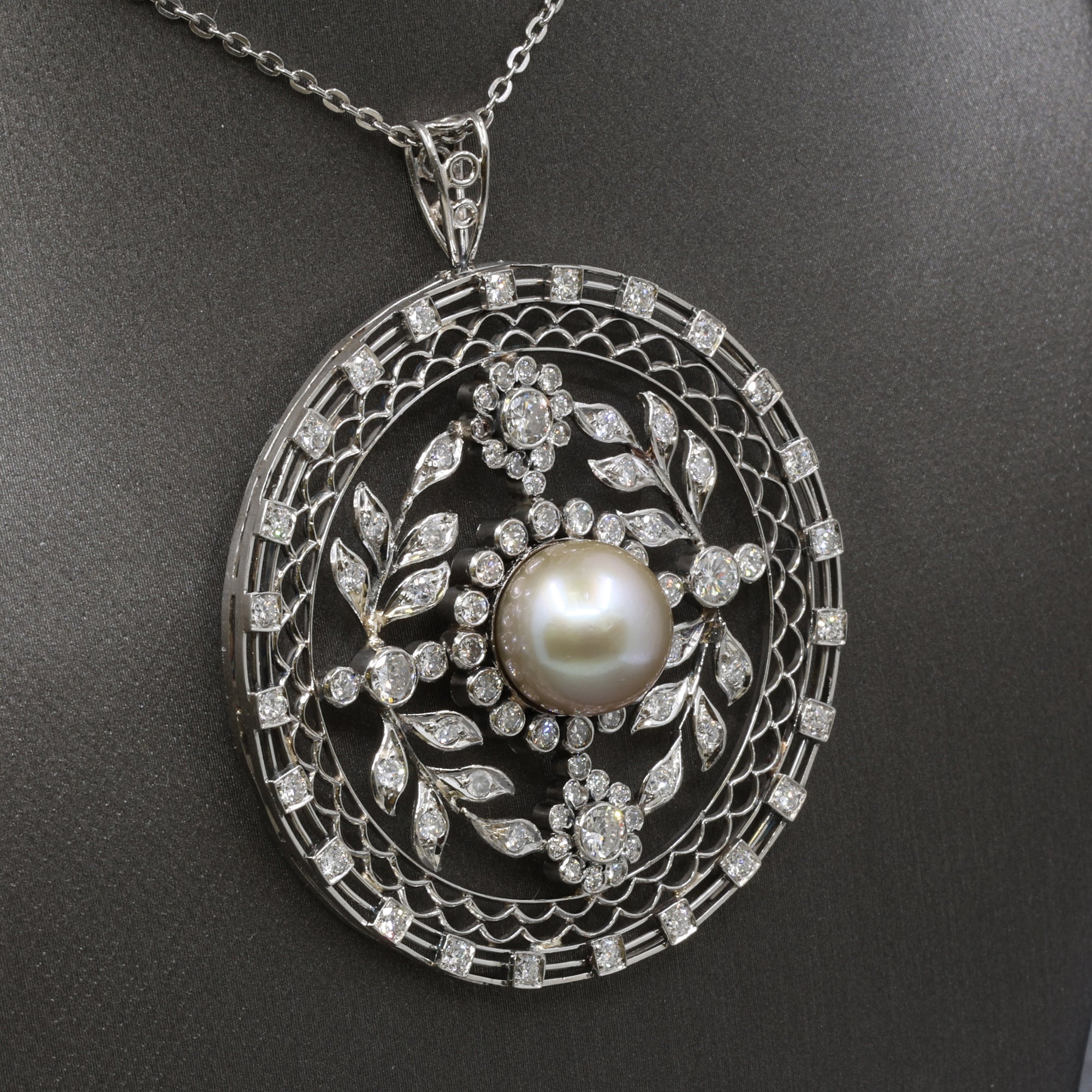 Late Art Deco Pearl and Diamond Medallion Pendant in Platinum