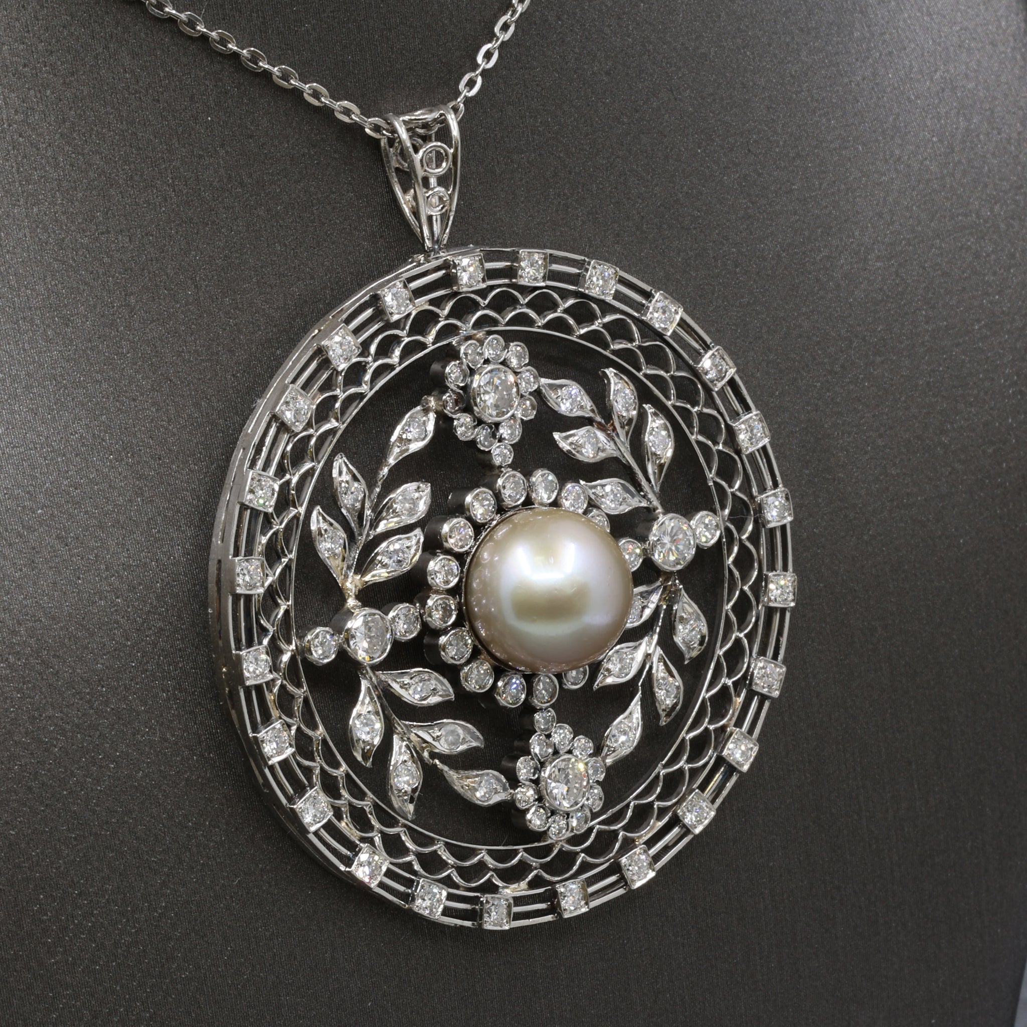Late Art Deco Pearl and Diamond Medallion Pendant in Platinum