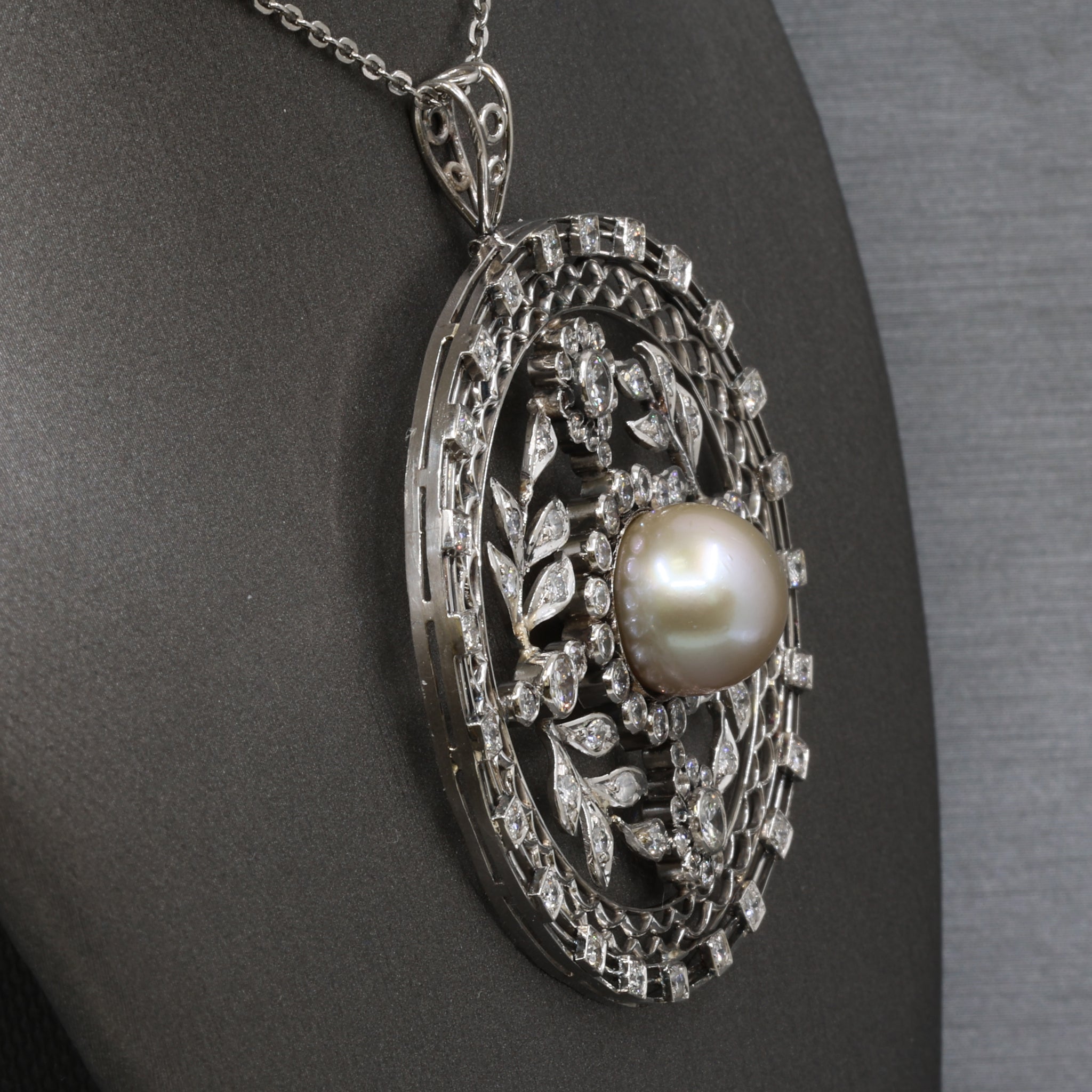 Late Art Deco Pearl and Diamond Medallion Pendant in Platinum
