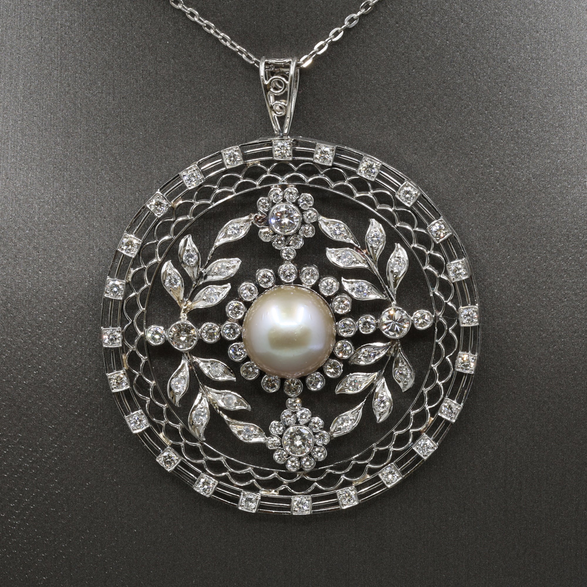 Late Art Deco Pearl and Diamond Medallion Pendant in Platinum