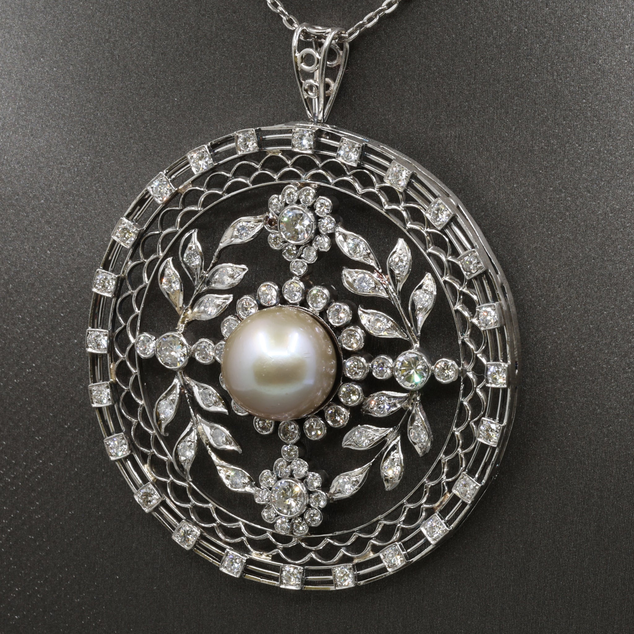 Late Art Deco Pearl and Diamond Medallion Pendant in Platinum