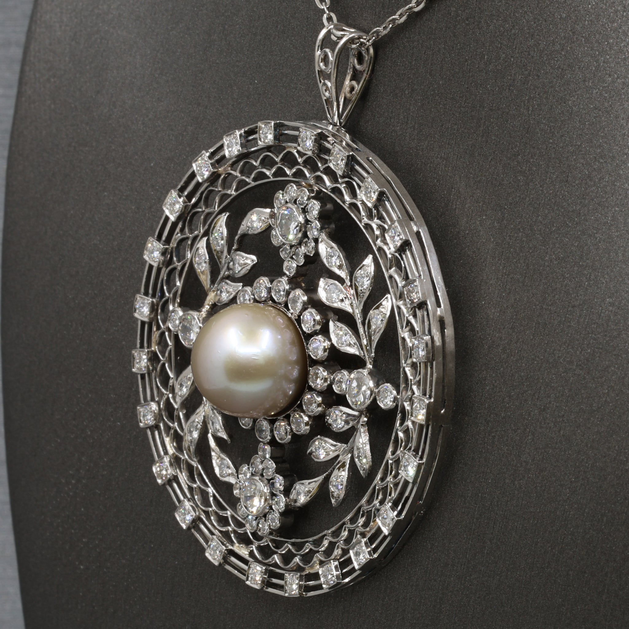 Late Art Deco Pearl and Diamond Medallion Pendant in Platinum