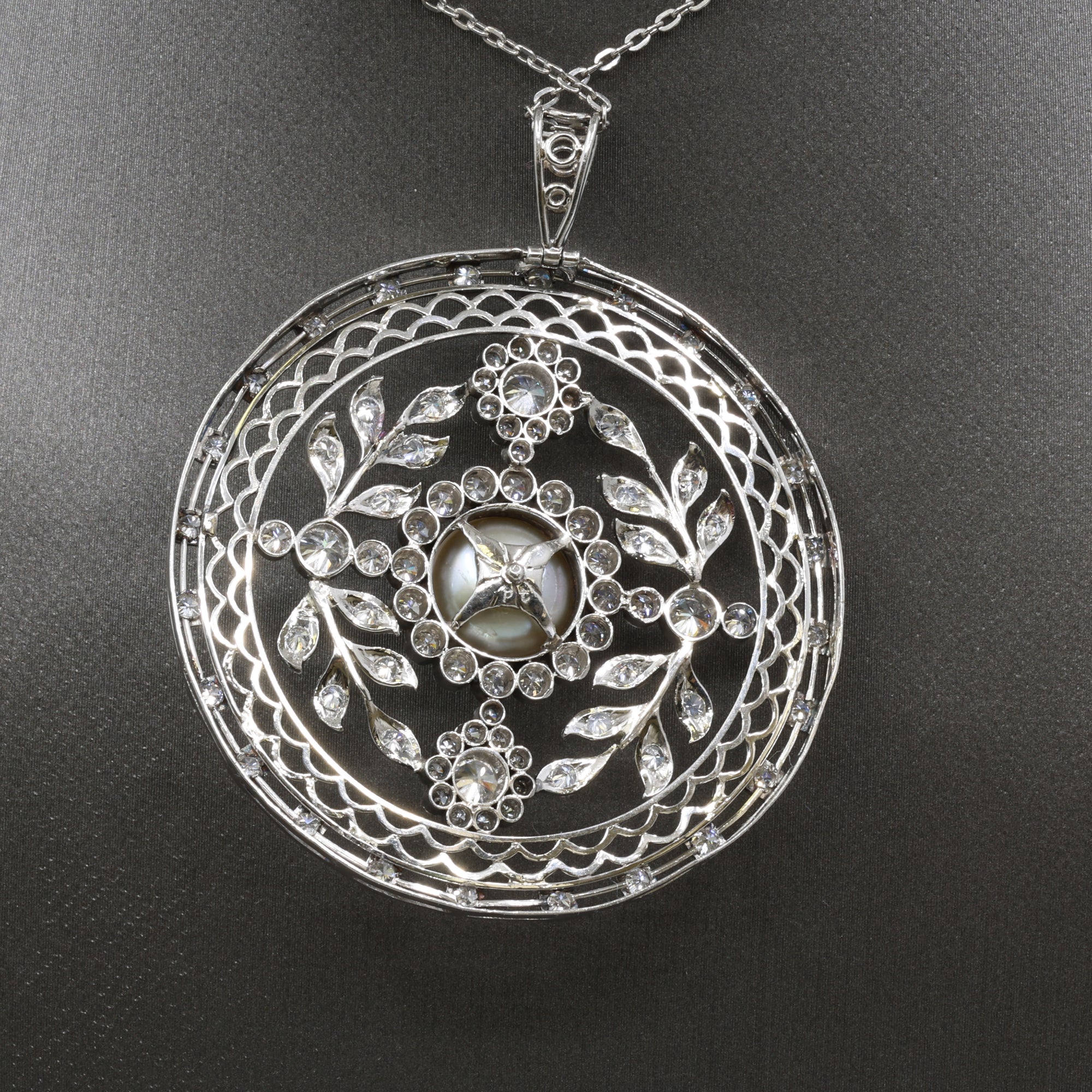 Late Art Deco Pearl and Diamond Medallion Pendant in Platinum