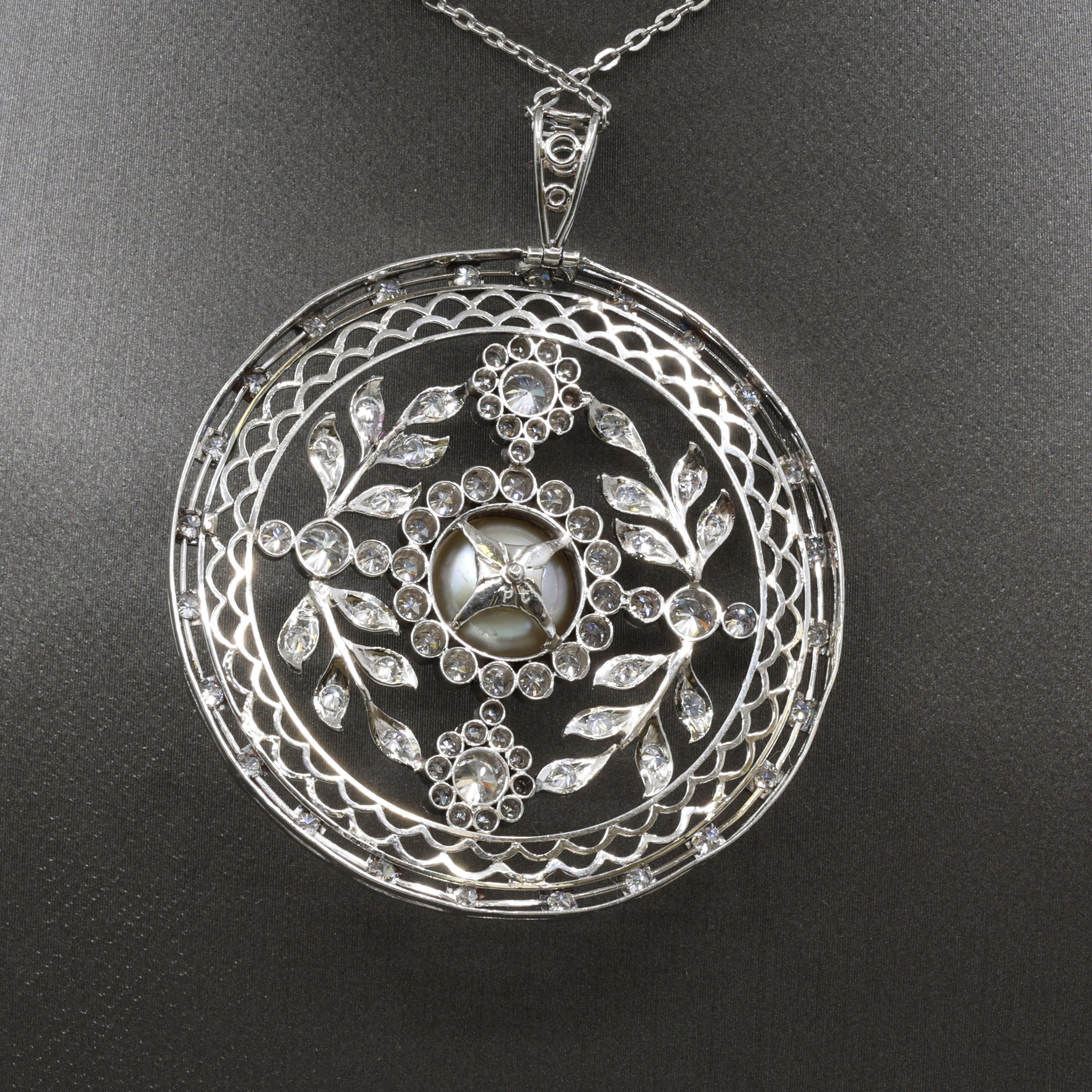Late Art Deco Pearl and Diamond Medallion Pendant in Platinum