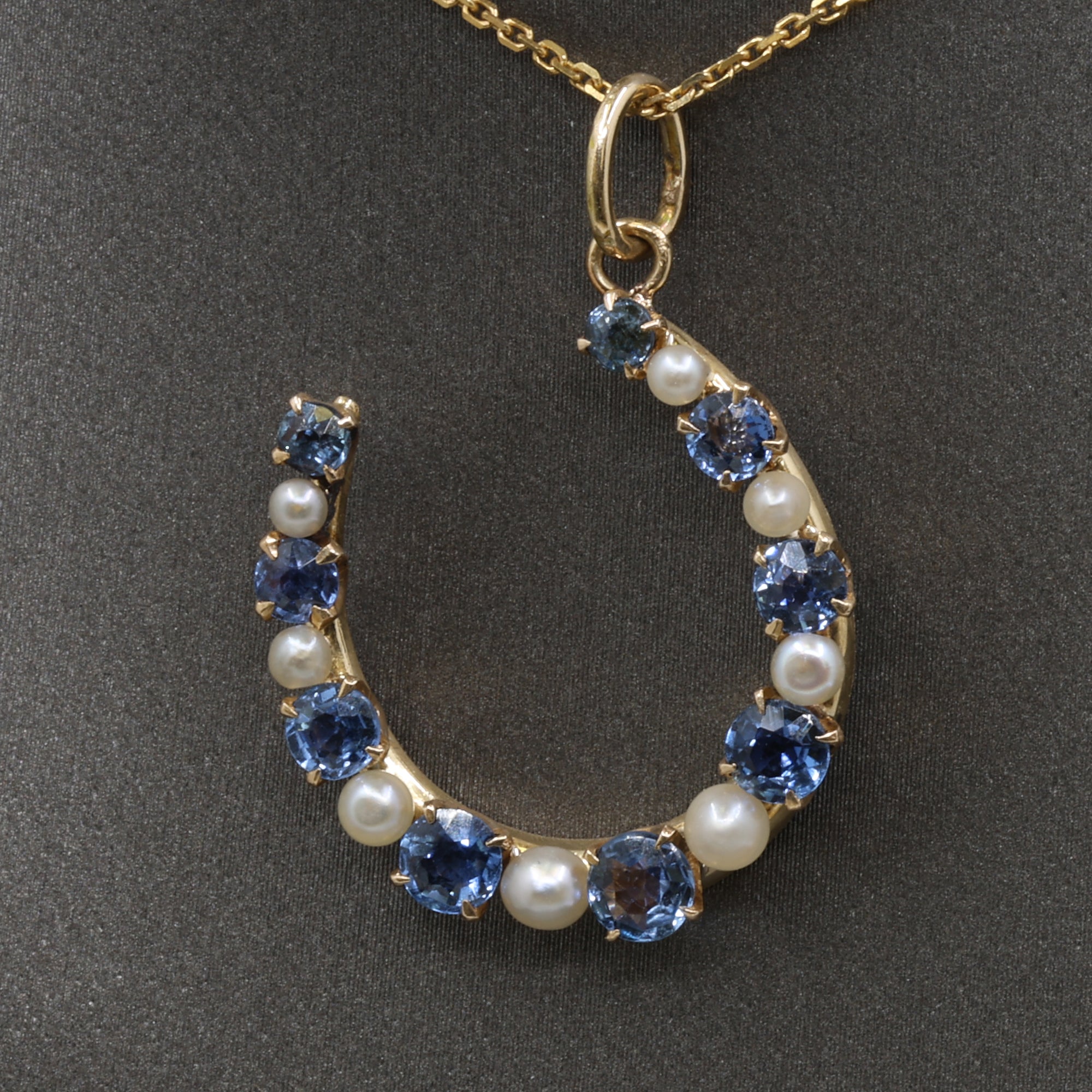 Victorian Montana Yogo Sapphire & Pearl Horseshoe Pendant in 14k Yellow Gold