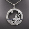 Exquisite Art Deco Old Cut Diamond and Sapphire Floral Pendant in Platinum