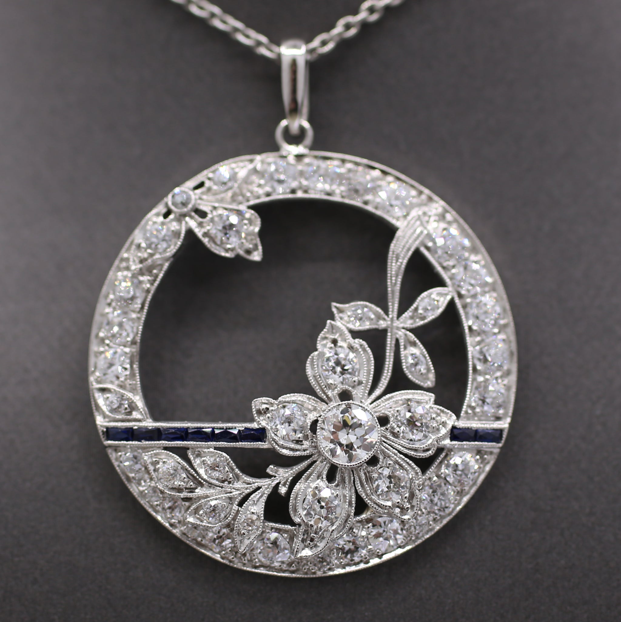 Exquisite Art Deco Old Cut Diamond and Sapphire Floral Pendant in Platinum