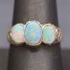 Late Victorian Bezel Set Opal Three Stone Engraved Band Ring in 14k Yellow Gold