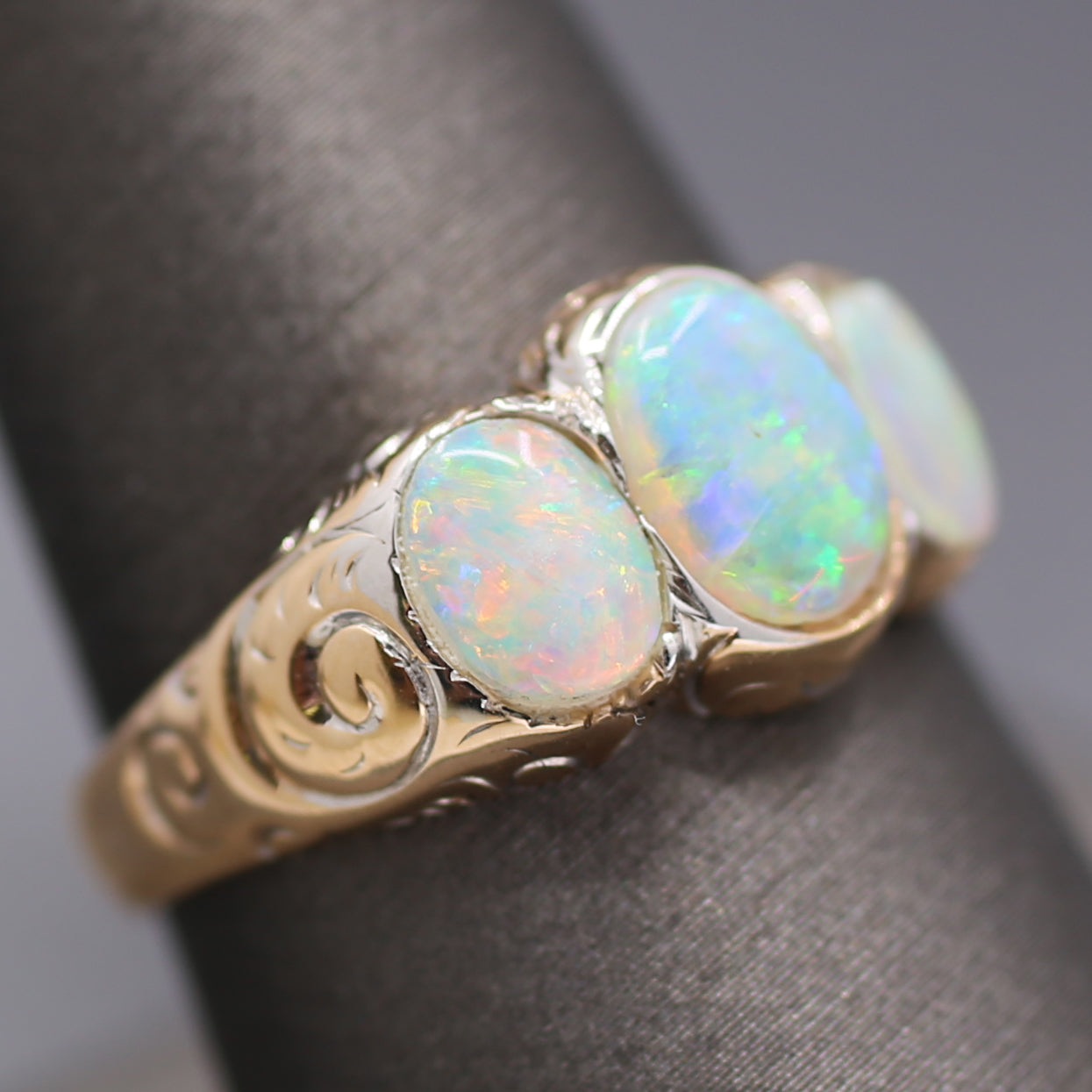 Late Victorian Bezel Set Opal Three Stone Engraved Band Ring in 14k Yellow Gold