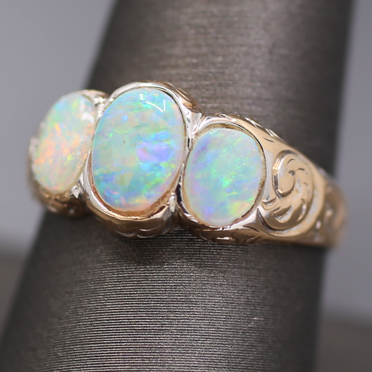 Late Victorian Bezel Set Opal Three Stone Engraved Band Ring in 14k Yellow Gold