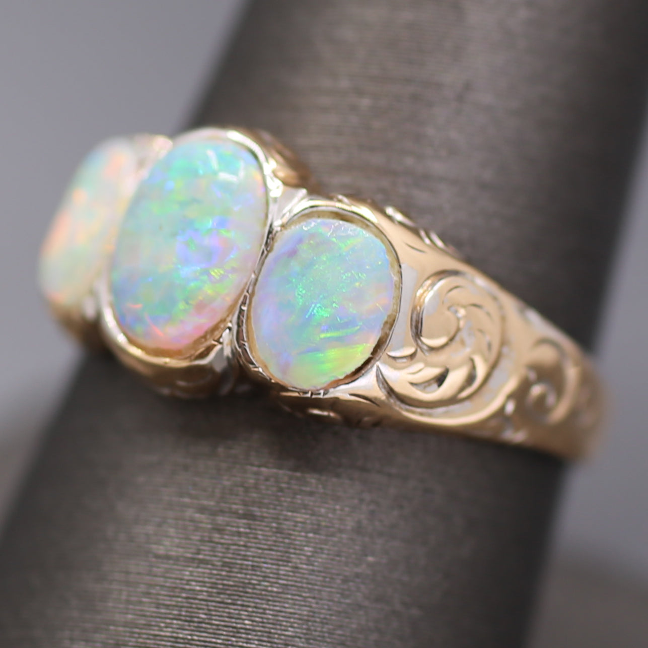 Late Victorian Bezel Set Opal Three Stone Engraved Band Ring in 14k Yellow Gold