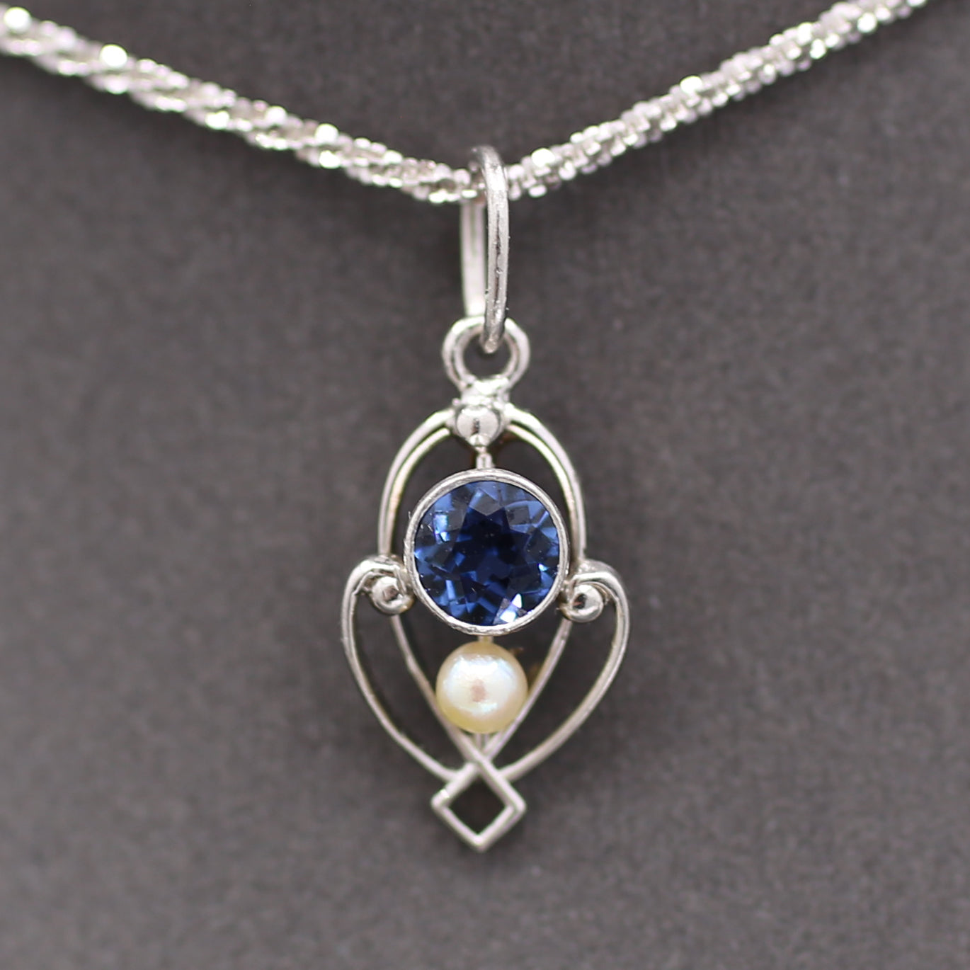 Petite Edwardian Yogo Montana Sapphire and Seed Pearl Pendant Charm in Platinum
