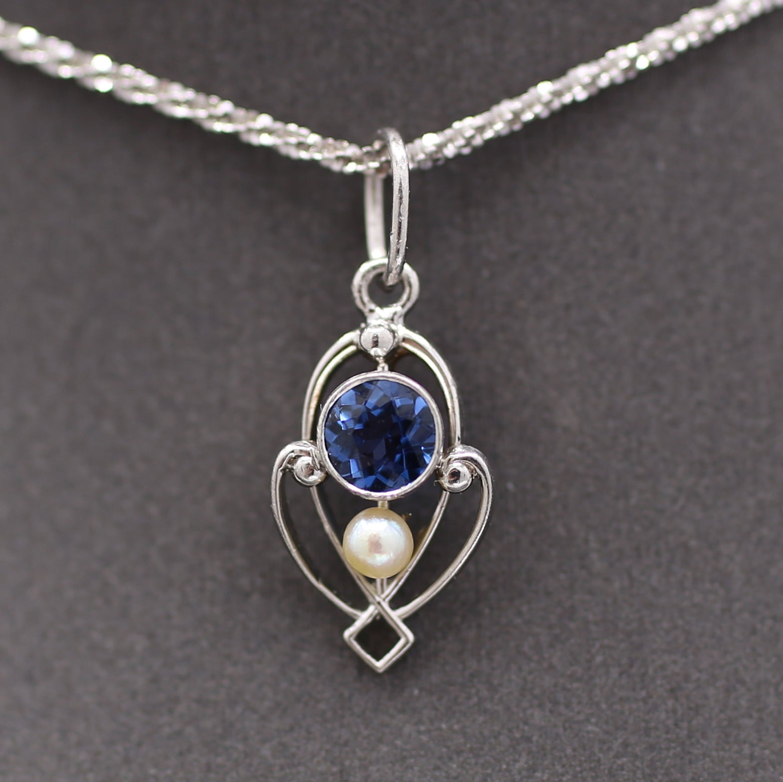 Petite Edwardian Yogo Montana Sapphire and Seed Pearl Pendant Charm in Platinum