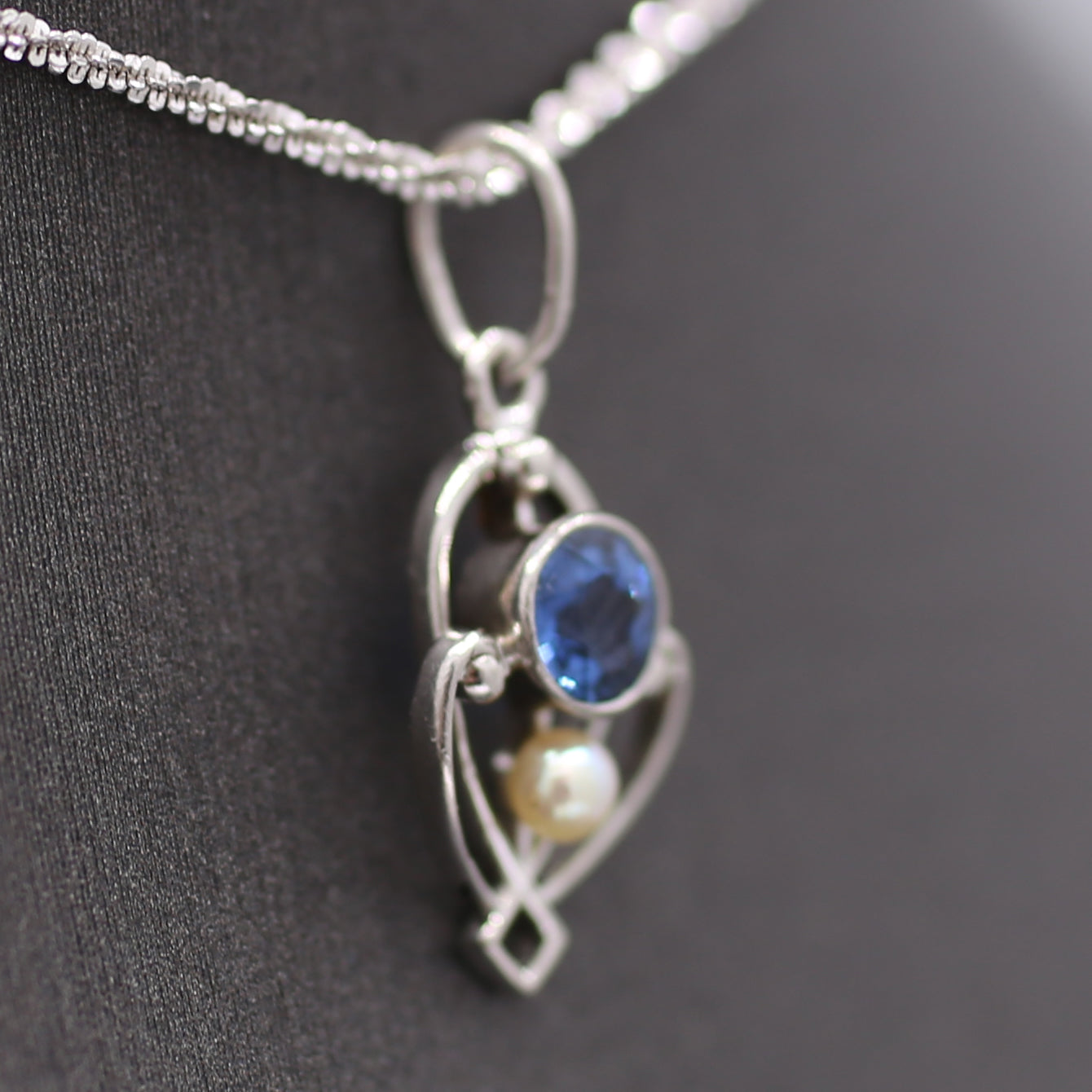 Petite Edwardian Yogo Montana Sapphire and Seed Pearl Pendant Charm in Platinum