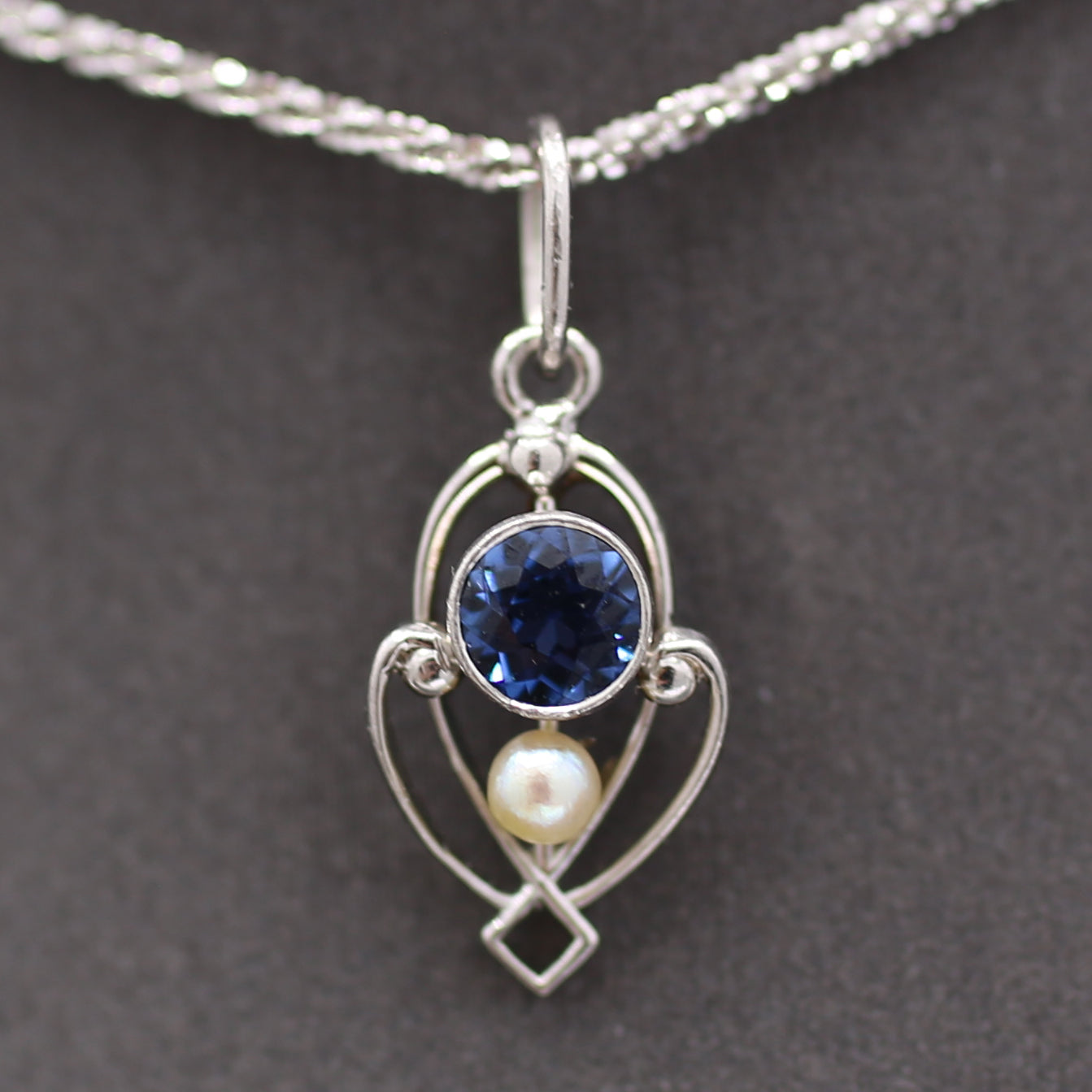 Petite Edwardian Yogo Montana Sapphire and Seed Pearl Pendant Charm in Platinum