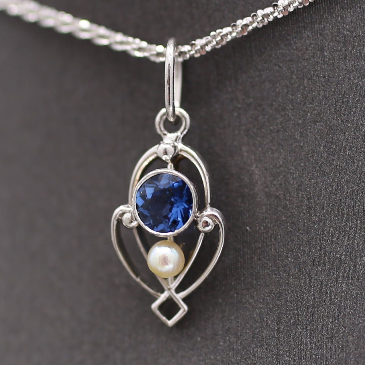 Petite Edwardian Yogo Montana Sapphire and Seed Pearl Pendant Charm in Platinum