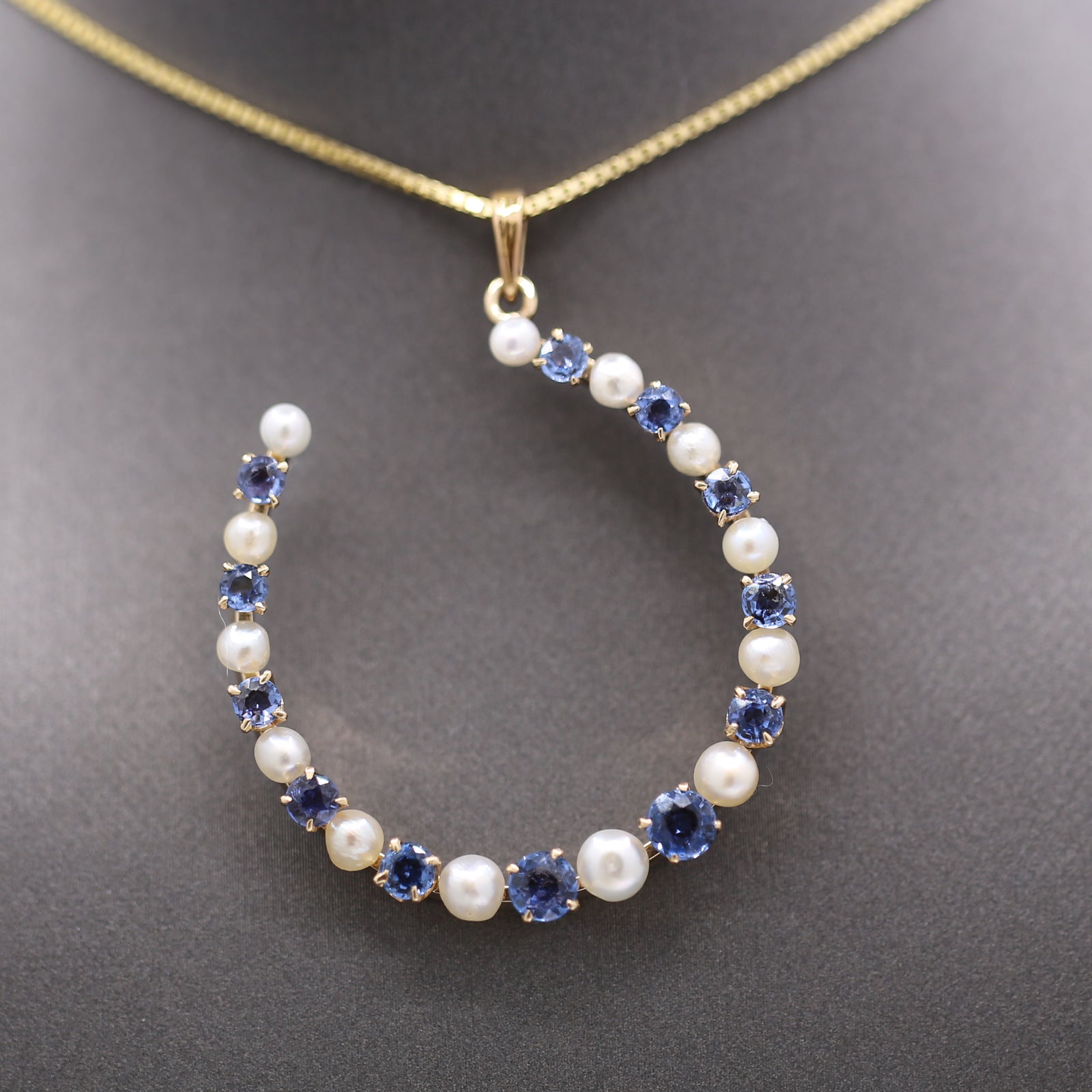 Victorian Yogo Montana Blue Sapphire and Pearl Horseshoe Good Luck Pendant in 14k